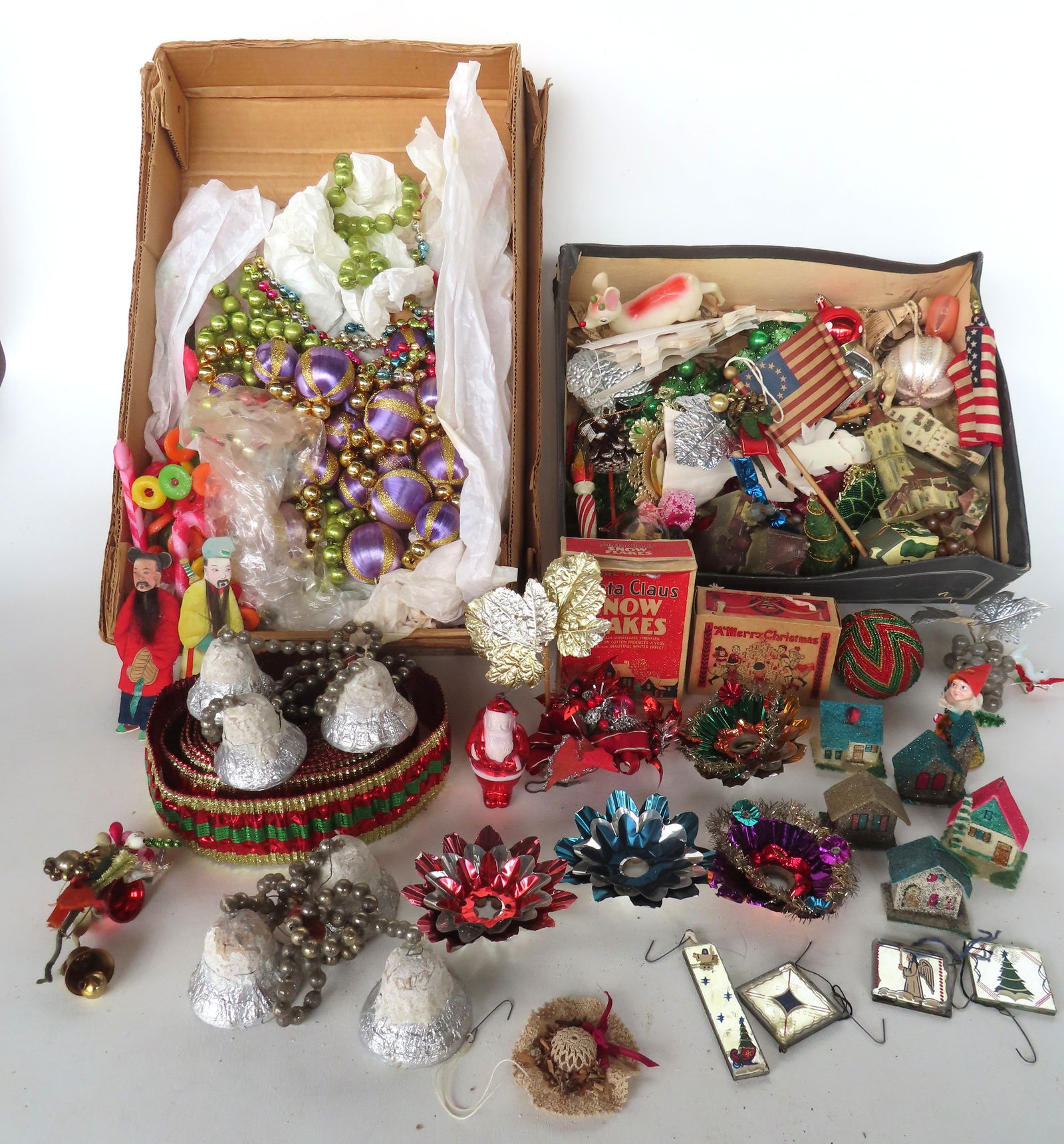 Large grouping of Christmas related collectibles including strings of beads, various ornaments, hand (1 of 20)