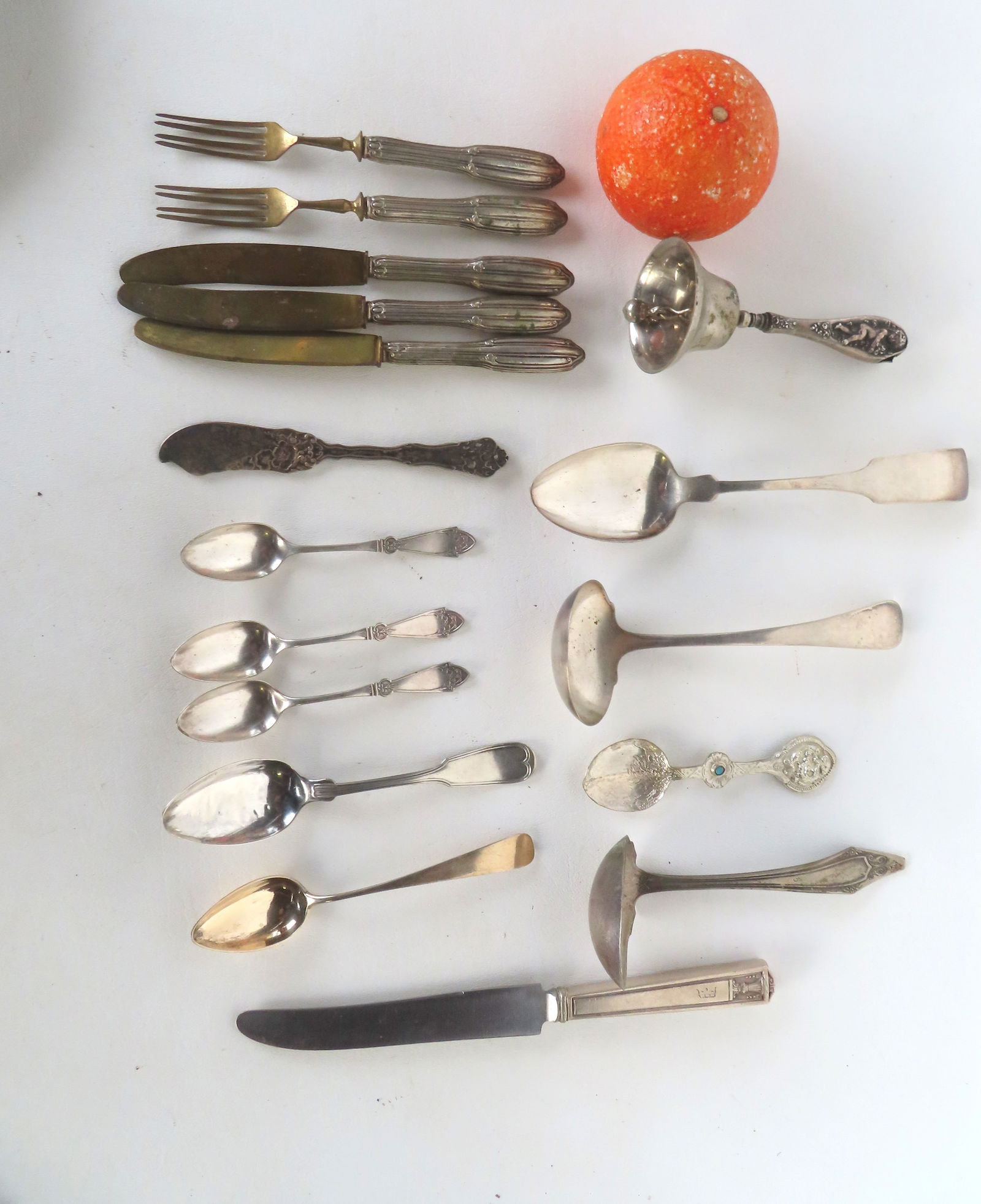 Grouping of mostly silver plate plus a dinner bell with sterling handle. Some pieces unmarked. Lot s (1 of 12)