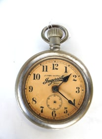An Ingersoll adverising tin pocket watch with original windup mechanism, signed "INGERSOLL WATCH / J