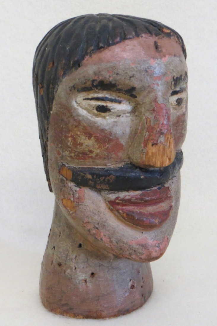 Carved polychromed folkart head, man with mustache in o: Carved polychromed folkart head, man with mustache in original paint - possibly from a whirligig. 19th century - 5.5"H