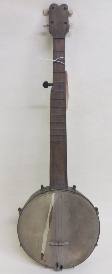 Old 5 string banjo. 33"L: Old 5 string banjo. 33"L