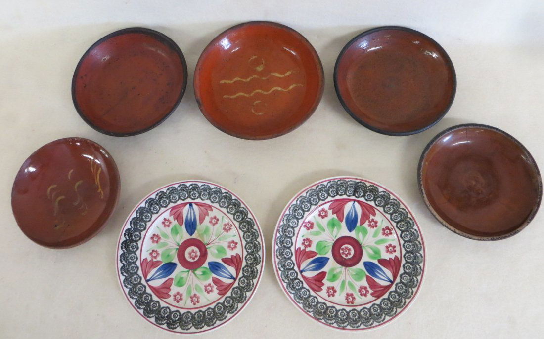 Seven early plates including 3 redware with no decorati: Seven early plates including 3 redware with no decoration, 2 redware with slip decoration (chips to perimeter) and 2 signed Adams & Co hand painted plates - 7.25"D to 9"D.