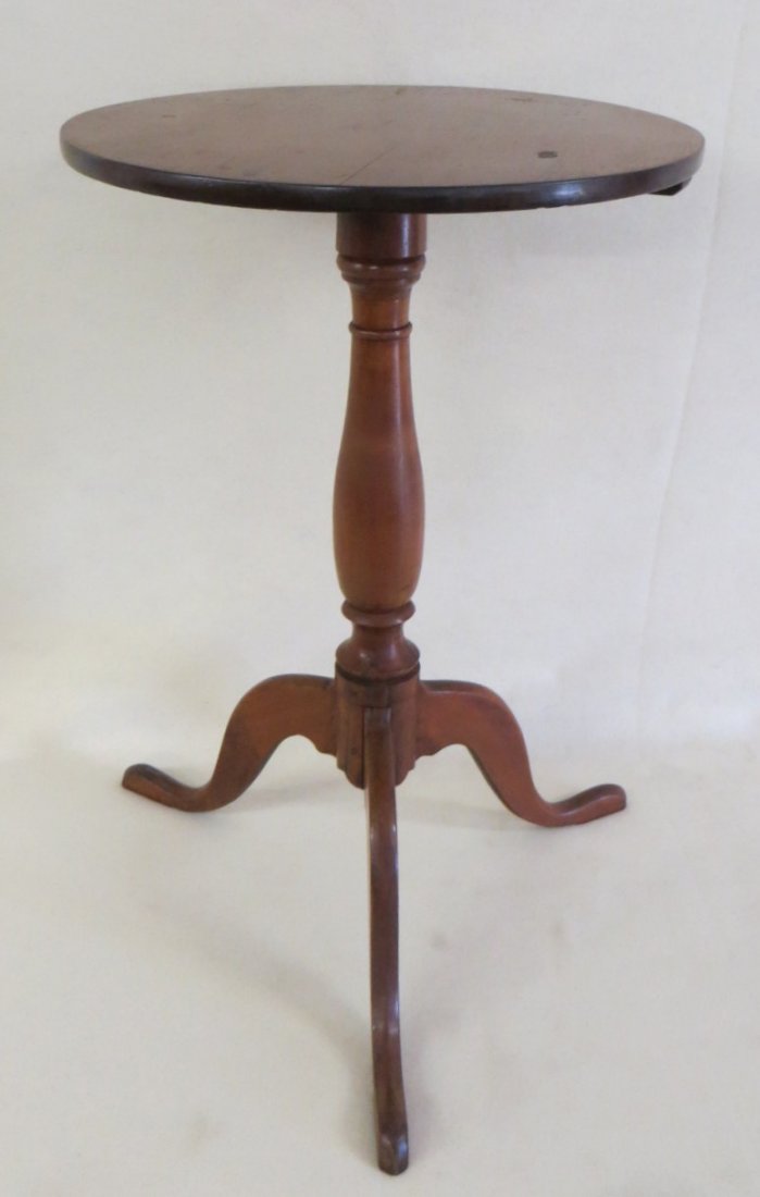 Candle stand with snake foot and round top in maple. 25: Candle stand with snake foot and round top in maple. 25.75"H x 17"D top.