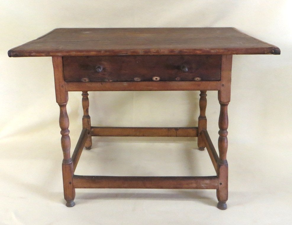 Tavern table with cross stretchers and single front dra: Tavern table with cross stretchers and single front drawer - top with bread board ends - button feet (worn in back) - 18th century. 36.5"L x 25.5"D x 25.5"H.