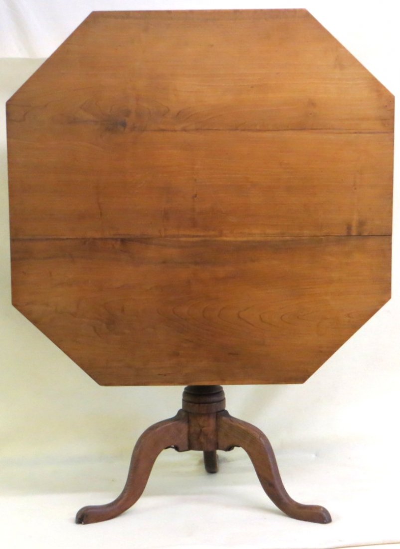 Refinished Queen Ann tilt top tea table with bird cage : Refinished Queen Ann tilt top tea table with bird cage and octagon cherry top. 27.75"H x 35.25" x 34.5"