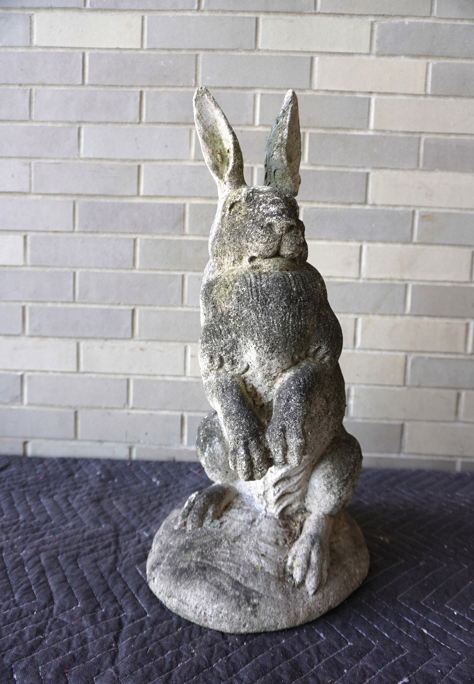 A cast stone large rabbit garden ornament, early to mid 20th century. One ear has been repaired (1 of 12)