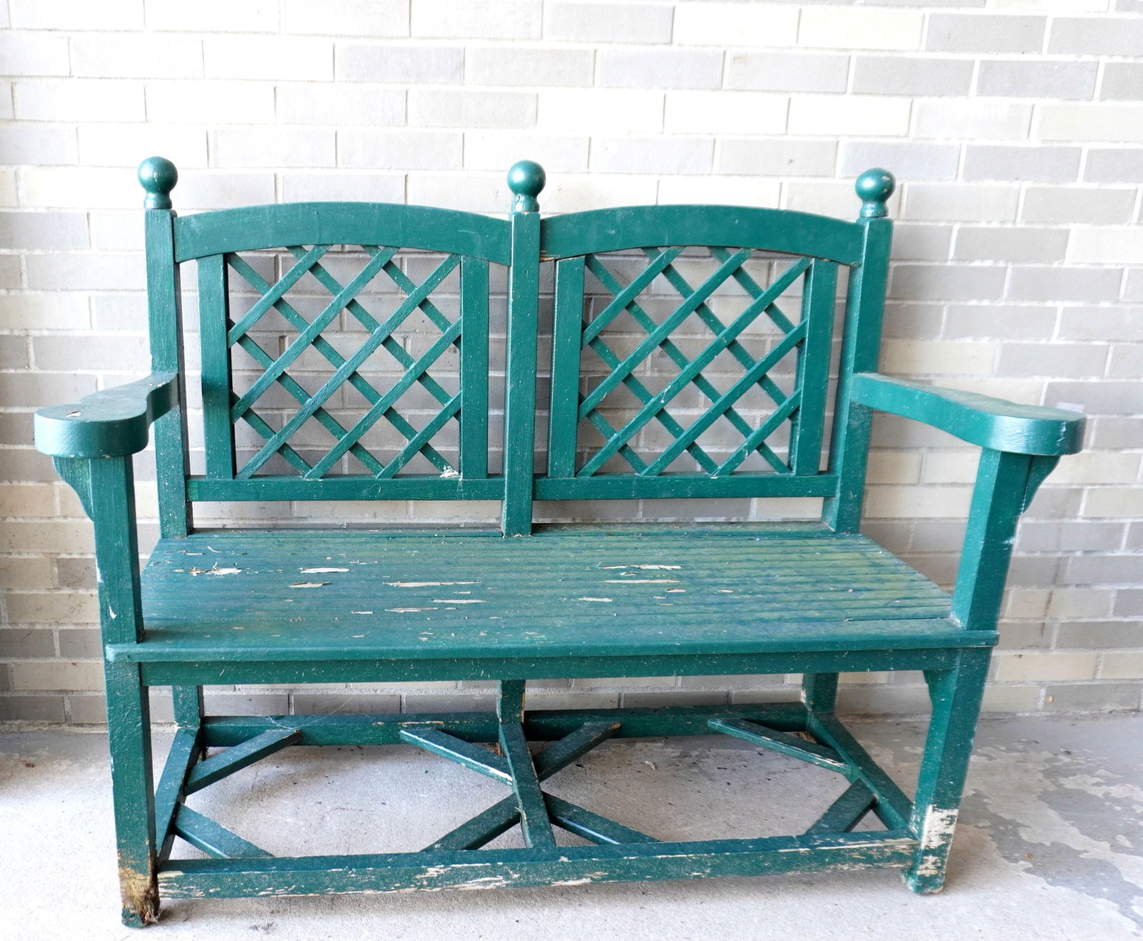 An architectural painted wooden park bench in original green paint - wear to paint - the bottom of (1 of 8)