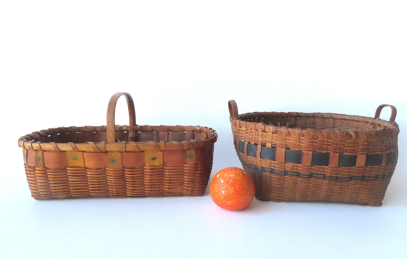 Two painted Native American baskets, 19th century: The first, a rectangular shaped market basket (1 of 11)