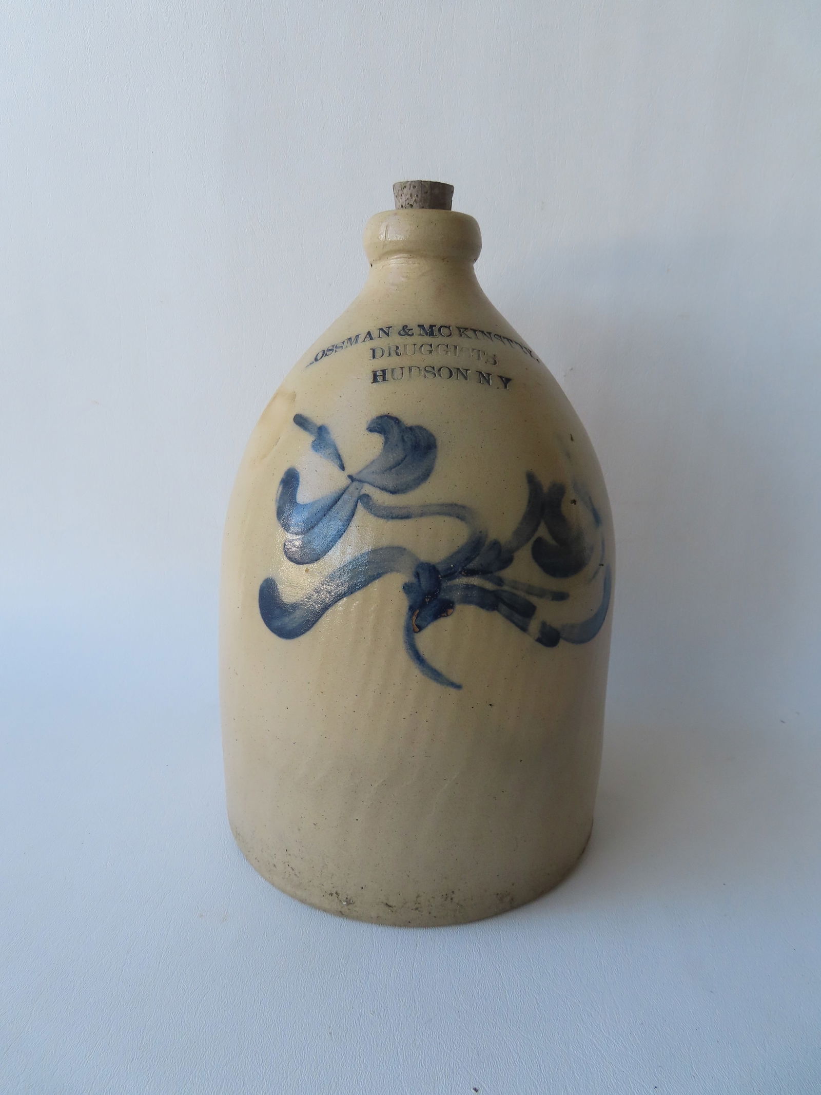 A Hudson NY advertising jug with the impressed mark of "ROSSMAN & MCKINSTRY. / DRUGGISTS / HUDSON (1 of 7)