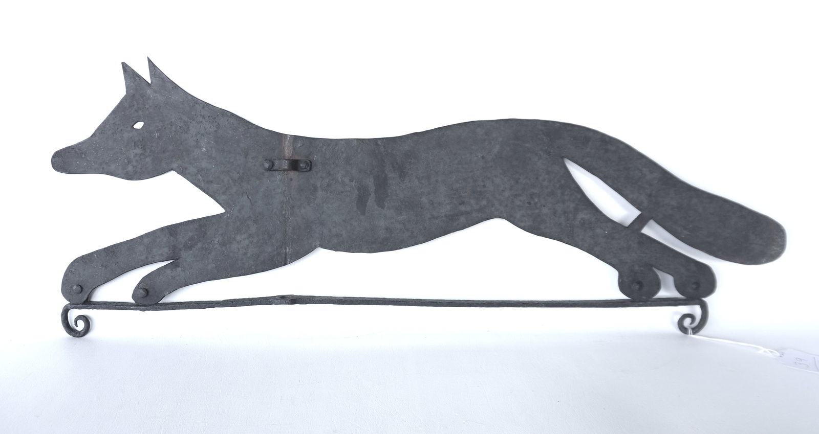 An early handmade silhouette sheet iron running fox weathervane, mounted on a hand forged iron base (1 of 12)