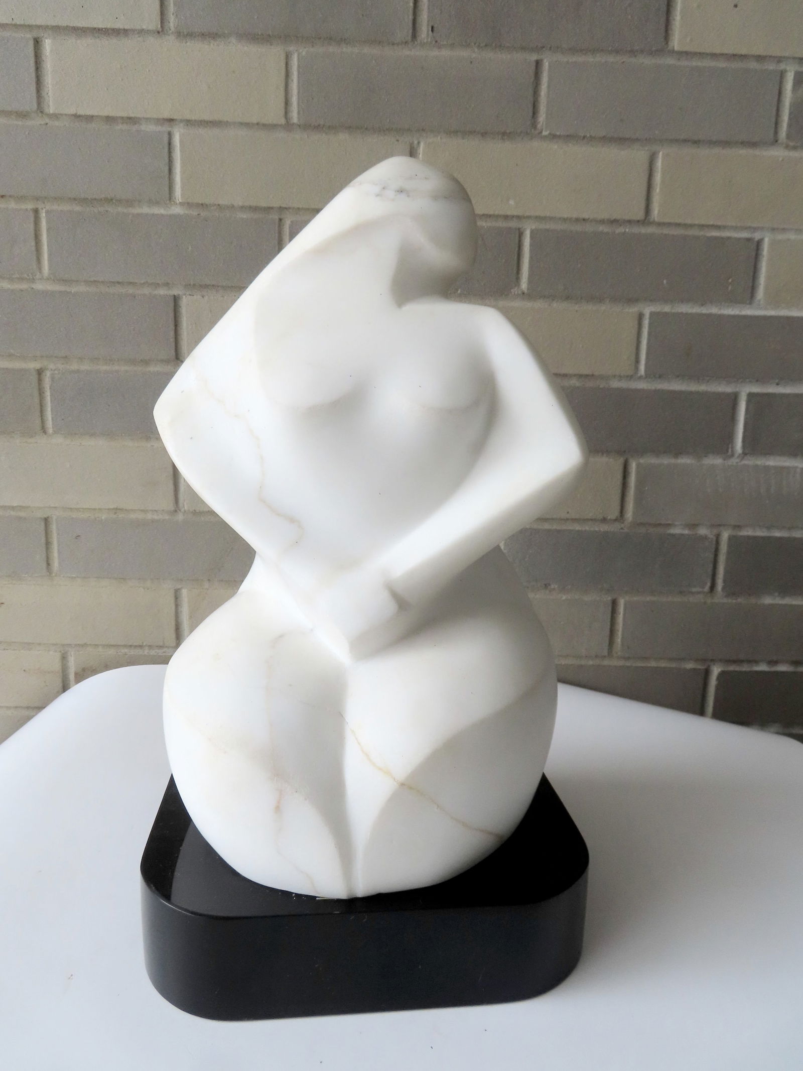 Lilly M. Tussey - Bulgarian/American, d.2005 (Attributed not signed, but from the estate of her: Lilly M. Tussey - Bulgarian/American, d.2005 (Attributed not signed, but from the estate of her husband - see paper label attached to sculpture). Modernistic sculpture of woman (Fatima) titled and sig