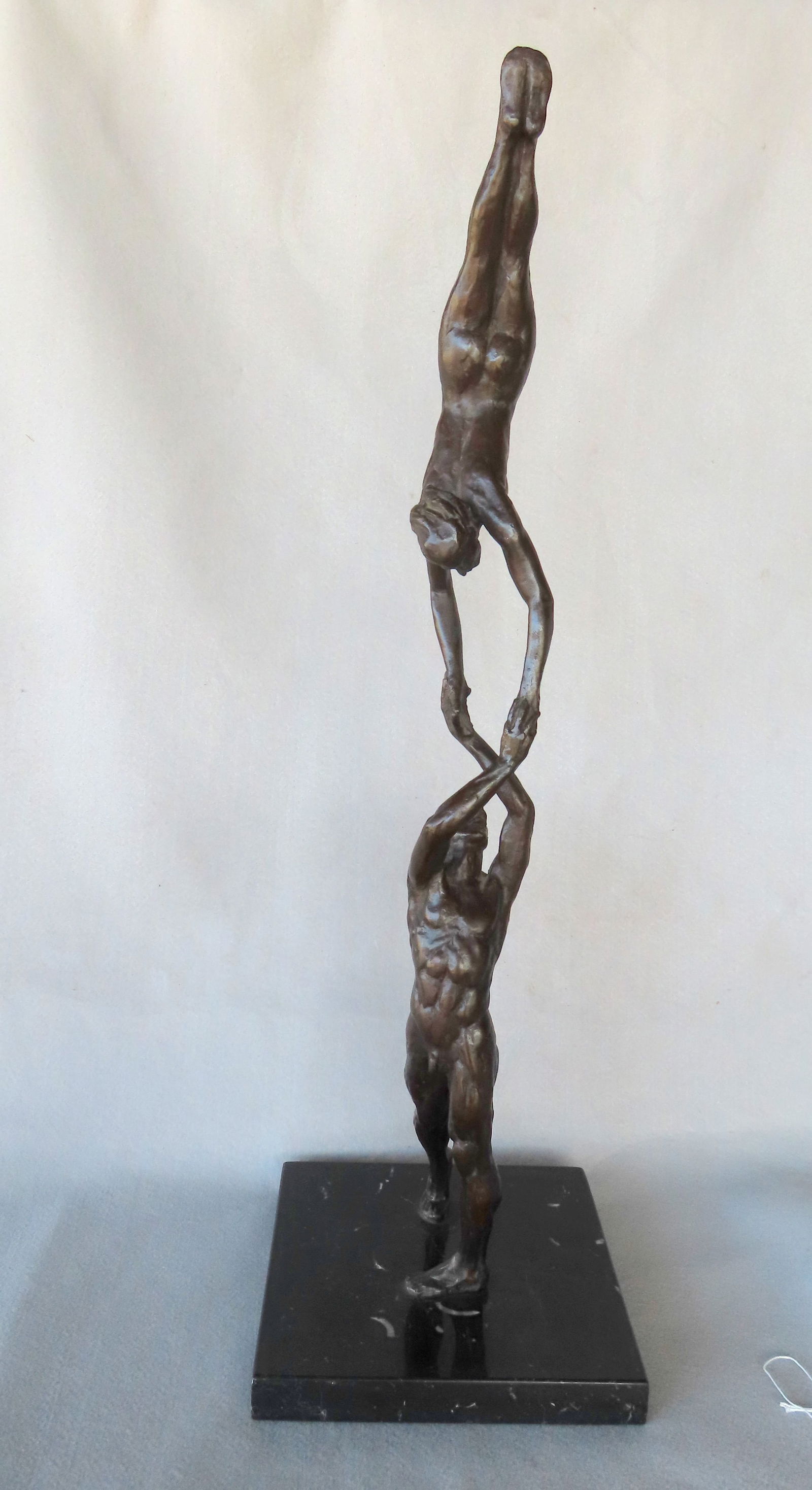 Joseph Brown bronze sculpture depicting nude man and nude lady performing gymnastics. Artist signed: Joseph Brown bronze sculpture depicting nude man and nude lady performing gymnastics. Artist signed and titled in pencil on bottom of marble platform "Joe Brown / Gymnasts" - Joseph Brown, 1909 - 1985