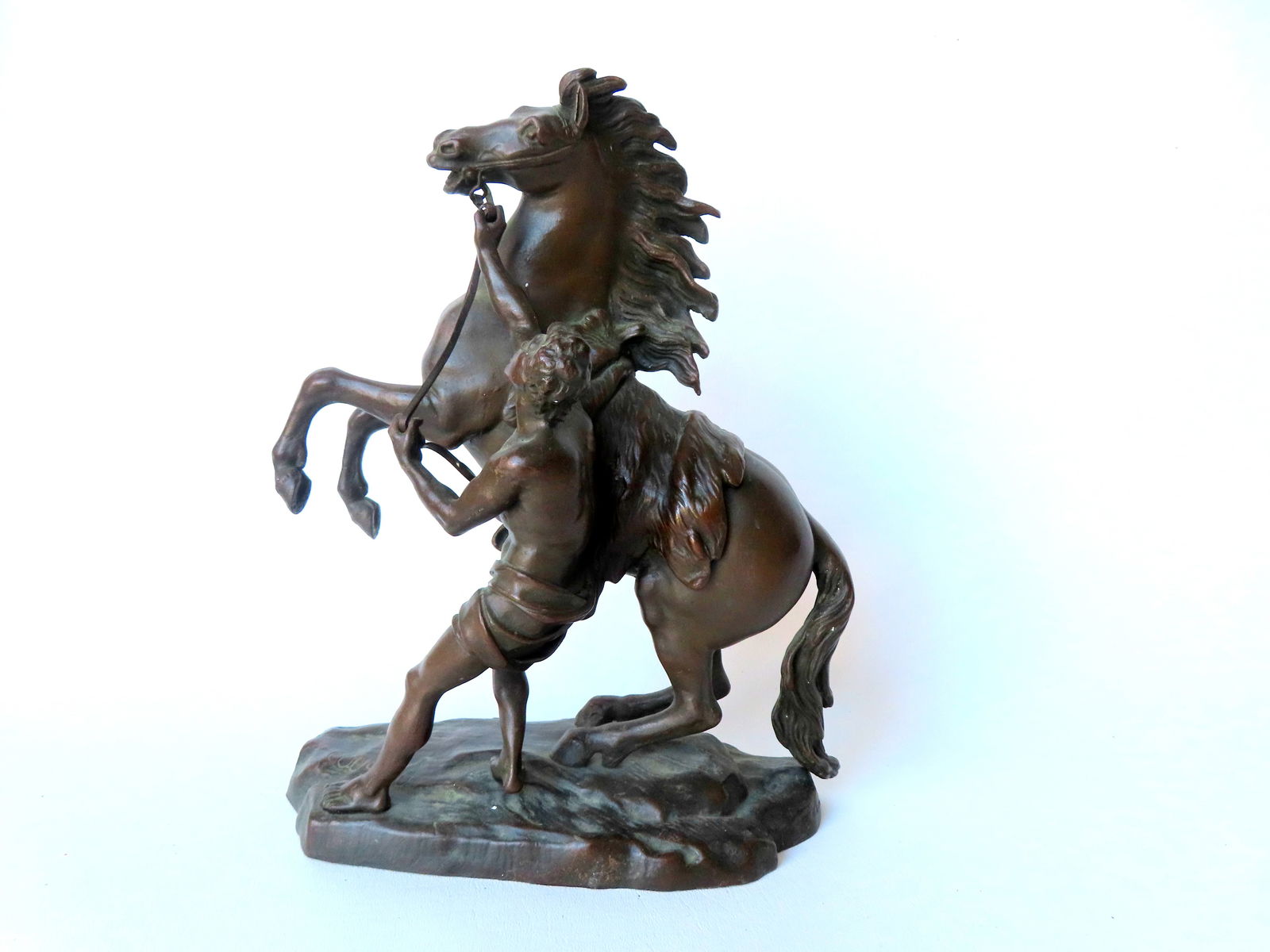 Bronze after Guillaume Coustou 19th century, active/lived in France. Bronze depicts man holding (1 of 7)