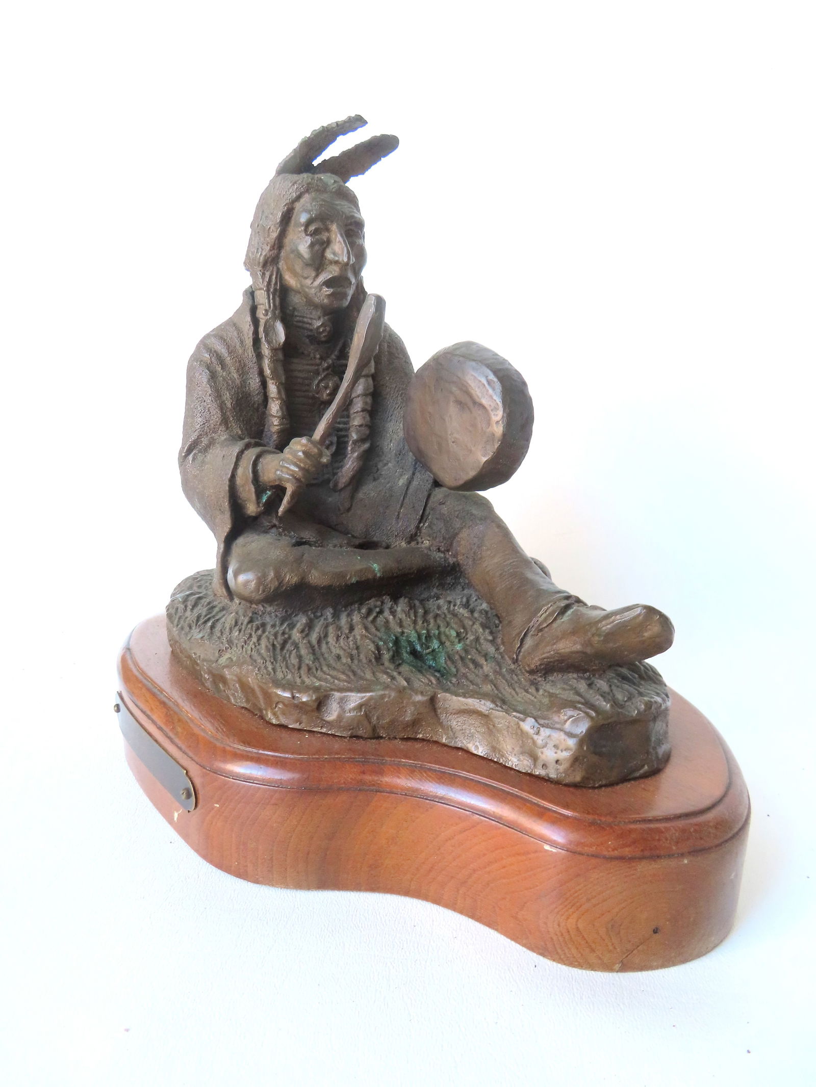 Bill Henderson (Born 1950) is active/lives in Canada. Bronze sculpture of seated Native American (1 of 8)