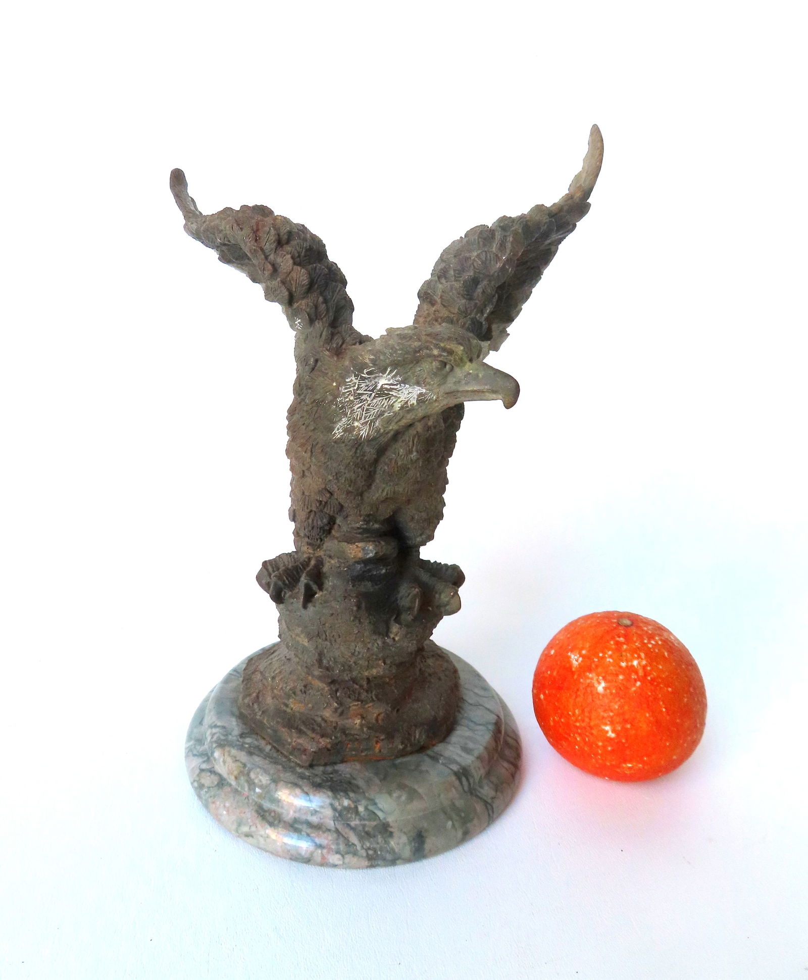 A cast iron spread wing eagle with bronze finish, attached to a faux marble base, 20th century. (1 of 6)