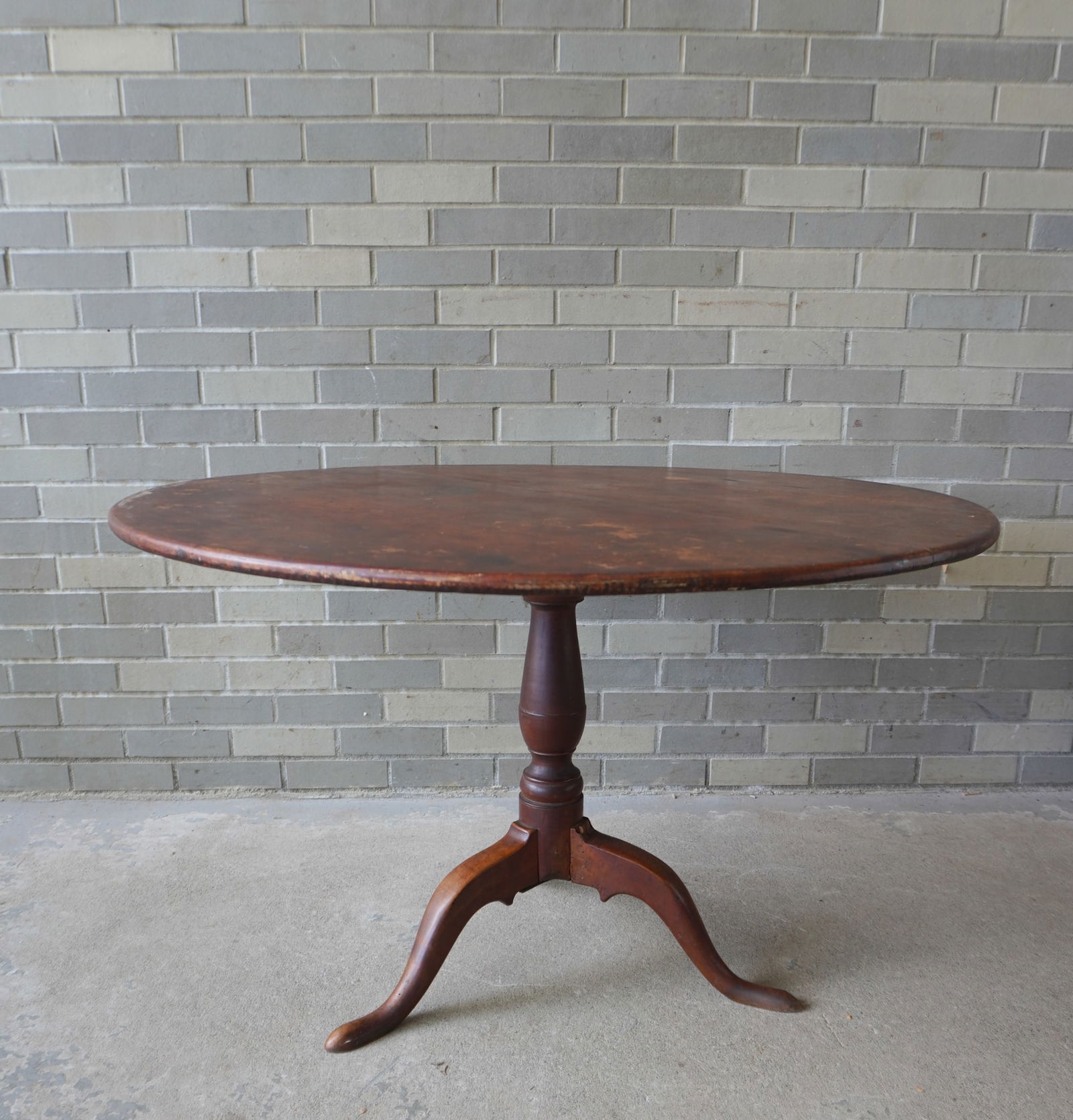 An American Queen Ann tilt-top tea table in hard to find original red paint. The turned pedestal (1 of 15)