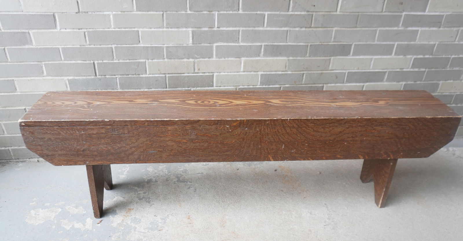 A good grain painted country bench with bootjack ends, very good original condition and very sturdy,: A good grain painted country bench with bootjack ends, very good original condition and very sturdy, 19th century. Measures 60"L x 10"D x 17 1/2"H. Provenance: From the Marni Bakst and William Sadler