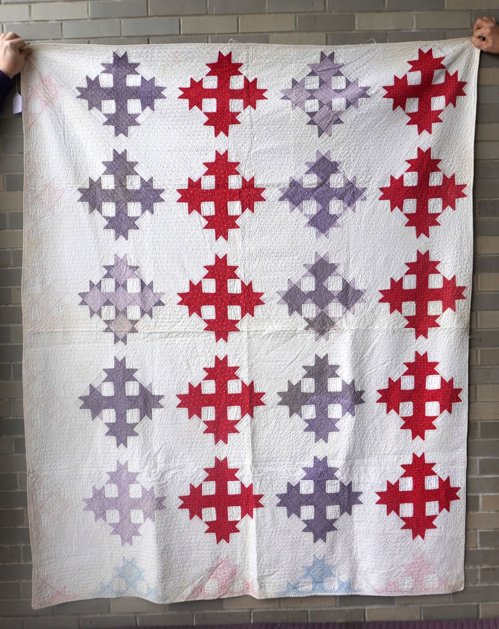 A hand sewn patchwork quilt in the Star-Cross pattern. All hand sewn with fine tight quilting and in: A hand sewn patchwork quilt in the Star-Cross pattern. All hand sewn with fine tight quilting and in very good condition, 19th century. Measures 64" x 78".