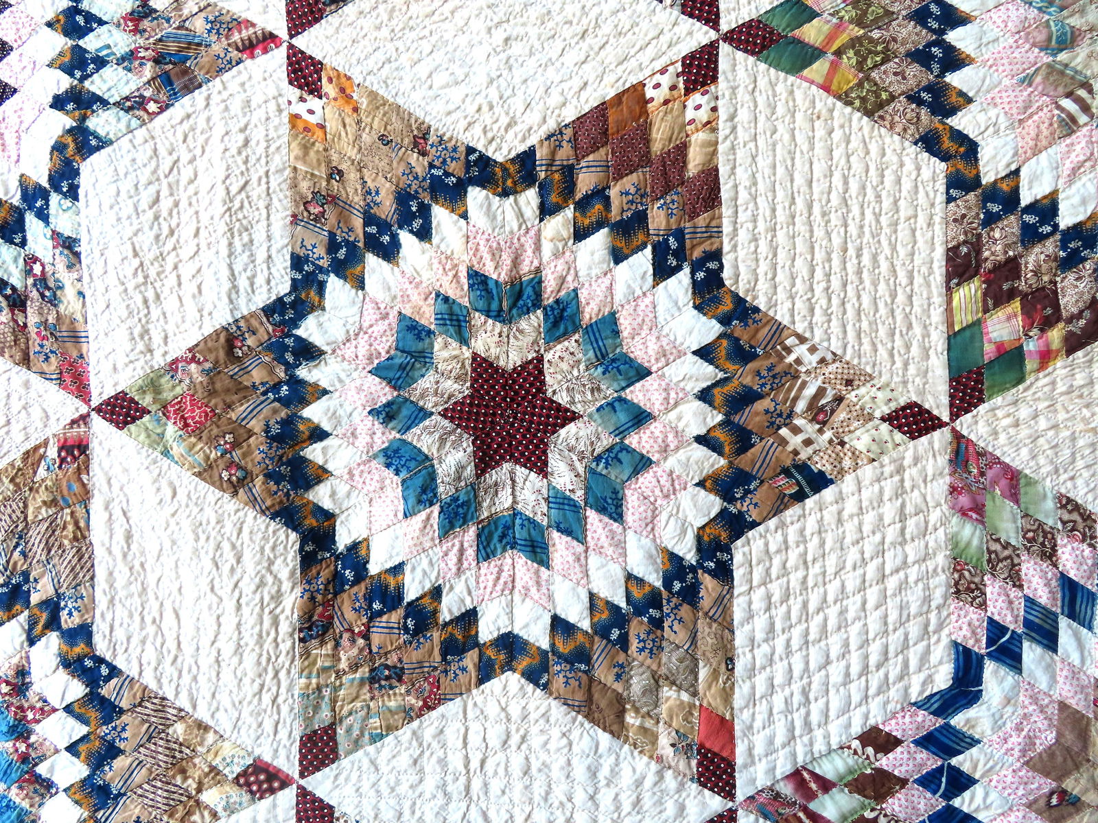A very fine star pattern patchwork quilt - mid-19th century - 78" x 91" - several small points of - 11