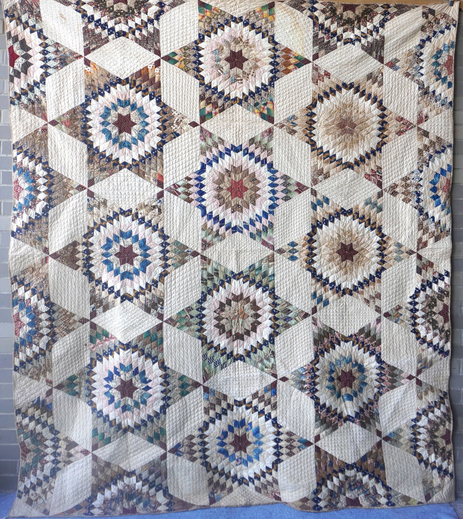 A very fine star pattern patchwork quilt - mid-19th century - 78" x 91" - several small points of - 2