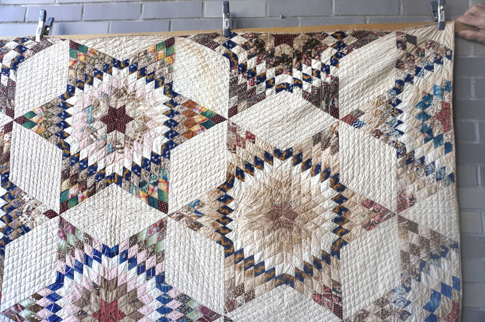 A very fine star pattern patchwork quilt - mid-19th century - 78" x 91" - several small points of - 4