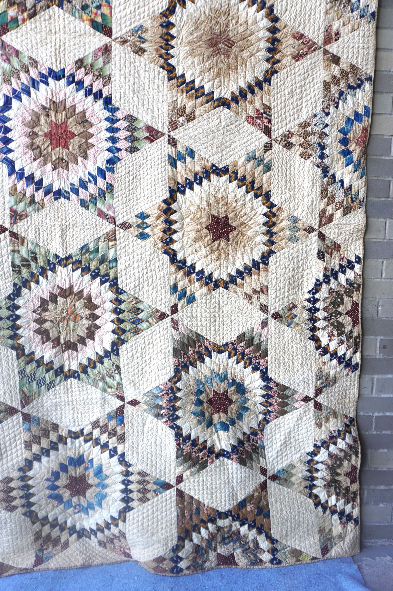 A very fine star pattern patchwork quilt - mid-19th century - 78" x 91" - several small points of - 5