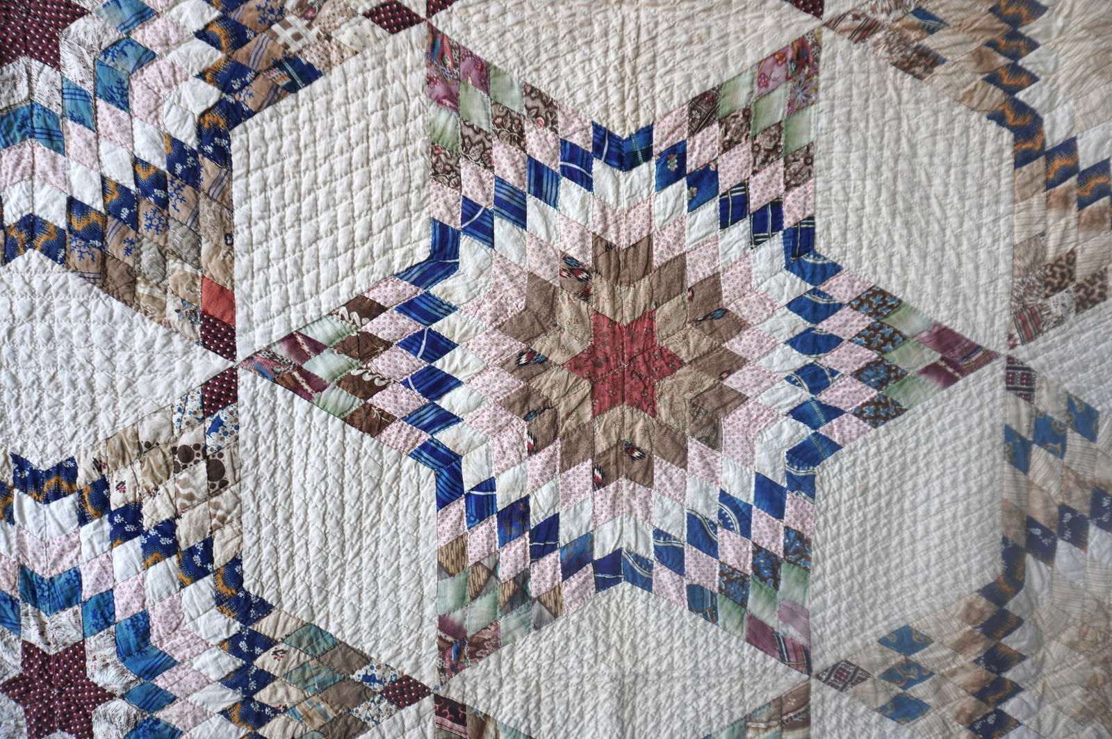 A very fine star pattern patchwork quilt - mid-19th century - 78" x 91" - several small points of - 7