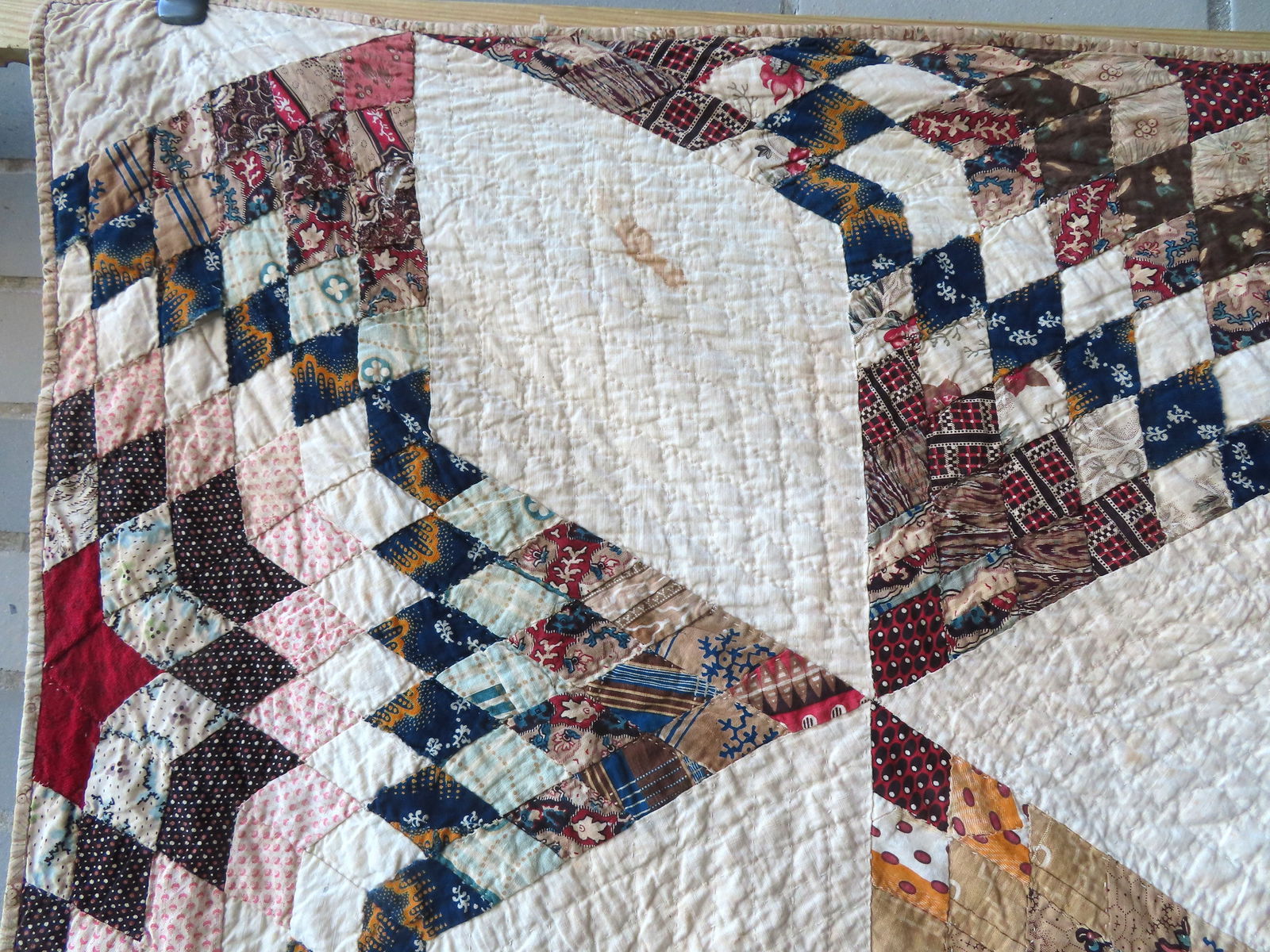A very fine star pattern patchwork quilt - mid-19th century - 78" x 91" - several small points of - 8
