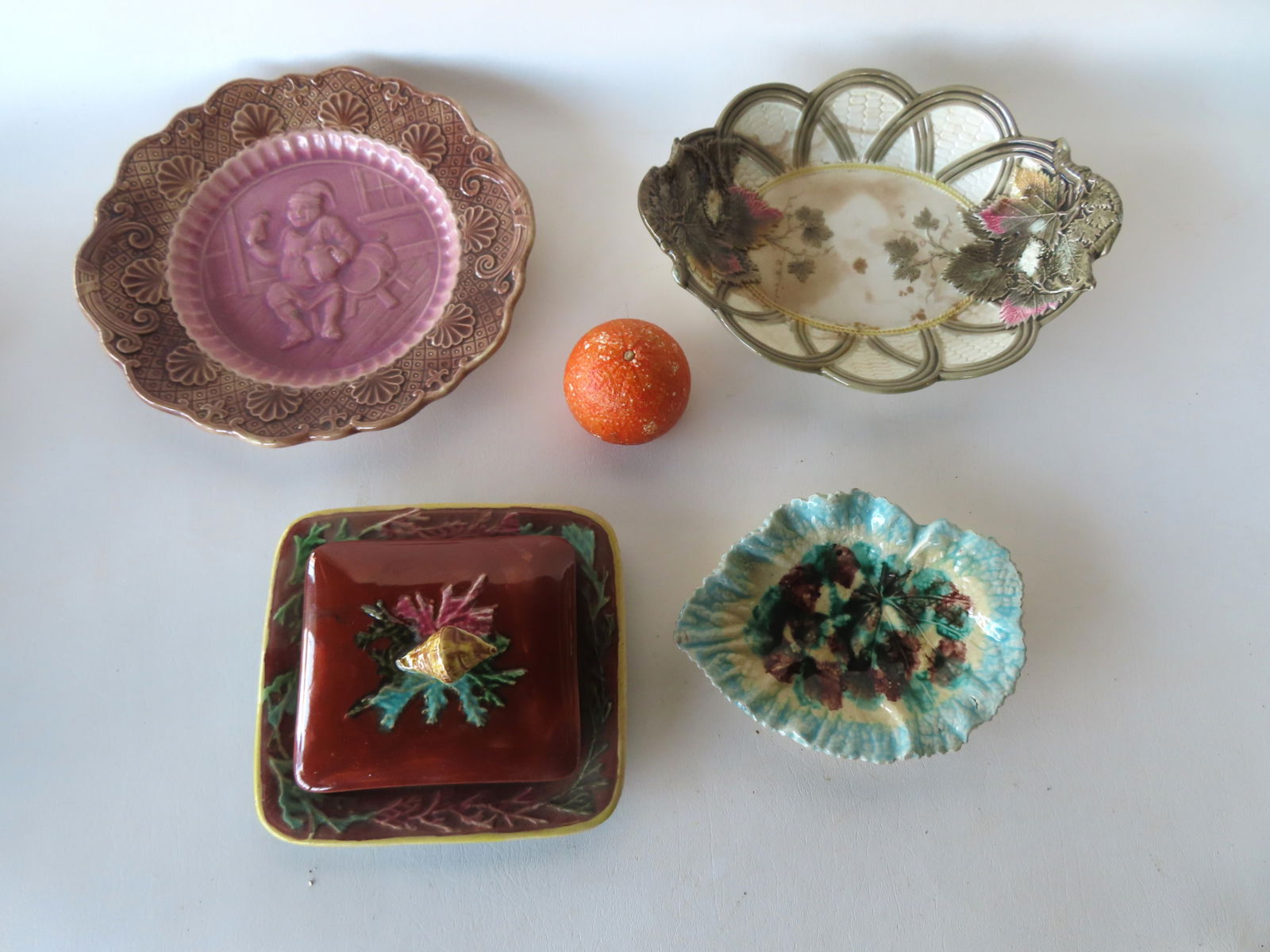 Four pieces of majolica including: A covered cheese dish having a lid with snail finial - crazing (1 of 10)