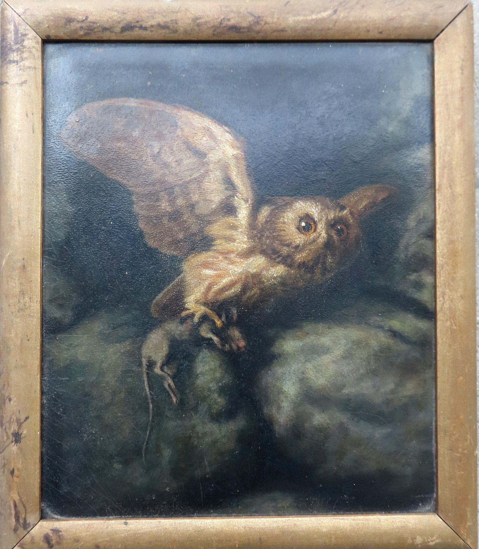 O/B Portrait of spread wing owl with animal in talons and appears to be perched on a stone wall or: O/B Portrait of spread wing owl with animal in talons and appears to be perched on a stone wall or window sill to a stone building, signed on reverse backing "Albert Smith 1884". The artist board has