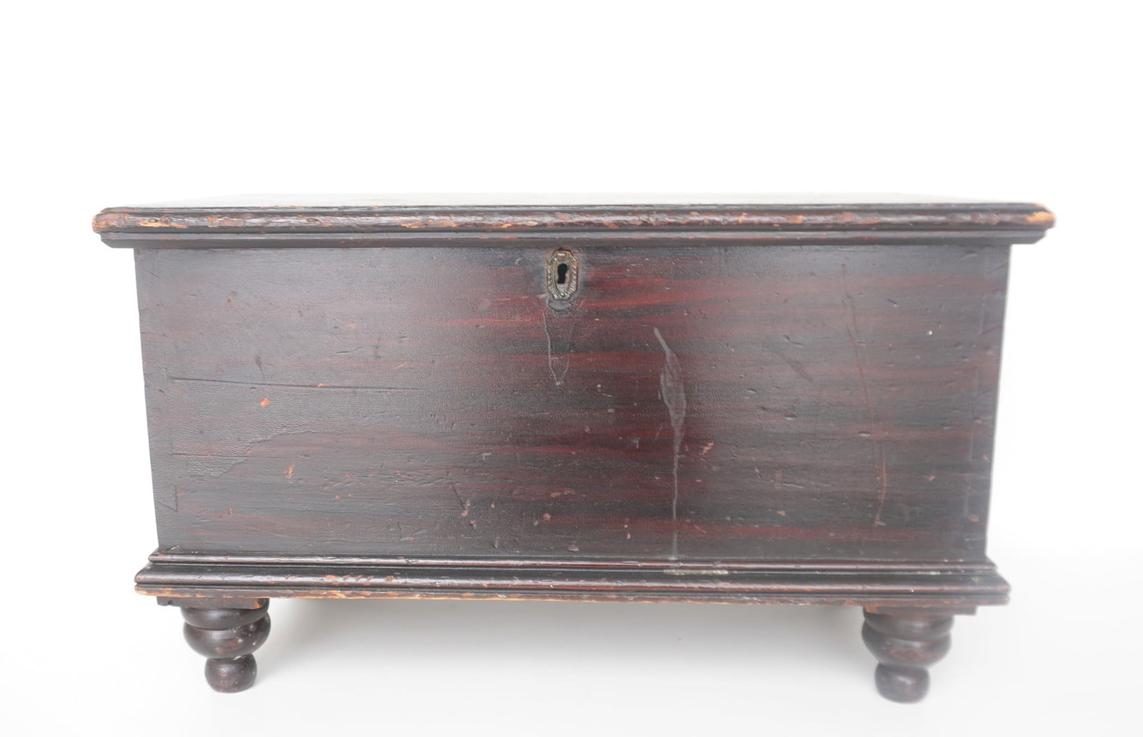 Small blanket box that appears to be in black and red grain paint covered with darkened varnish to (1 of 19)
