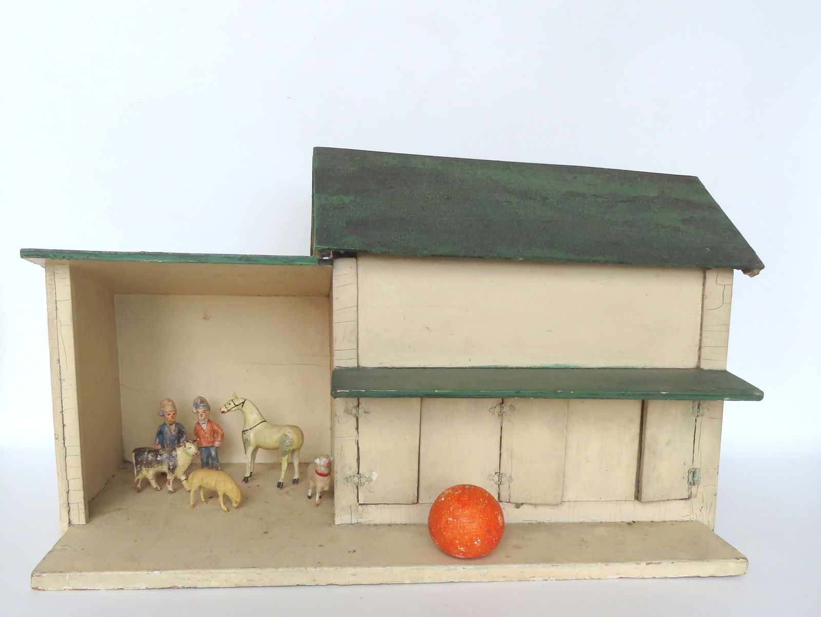 A handmade wooden barn model, with 6 composition figures found within the barn - the figures all (1 of 9)