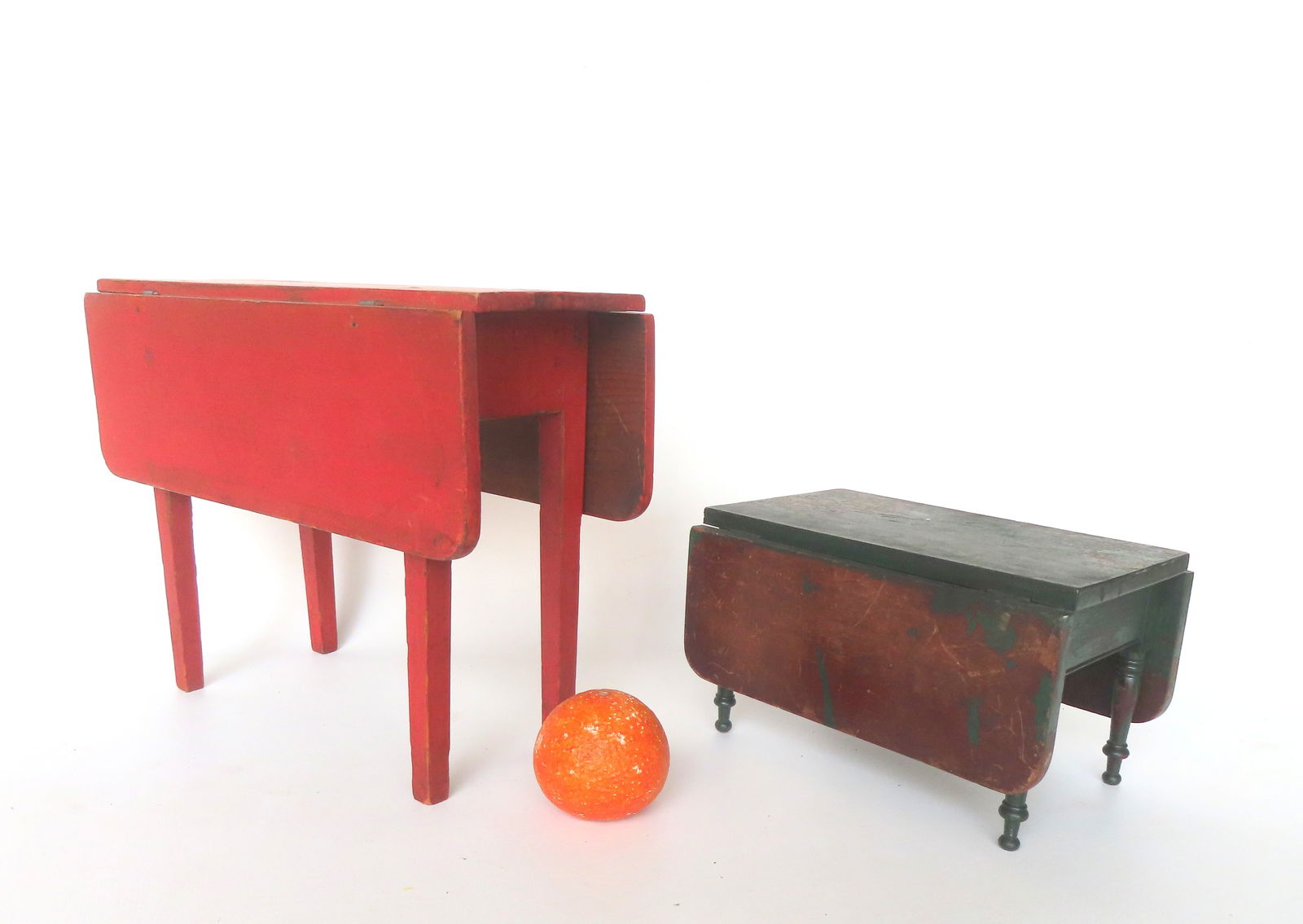 Two early miniature drop leaf tables. The first, with tapered legs in original dry red paint with (1 of 13)
