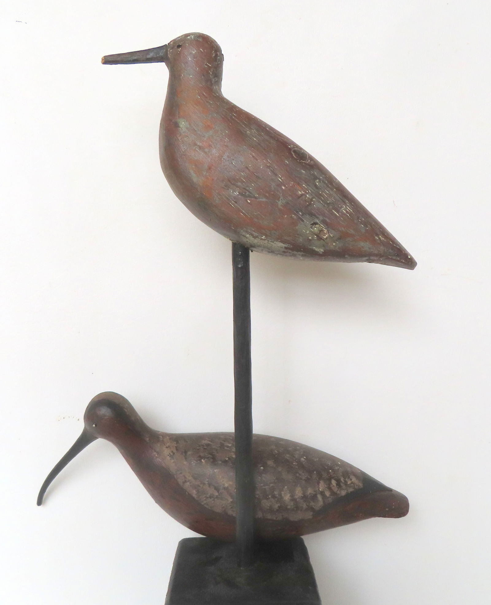 Two carved wooden shorebird decoys. The first, an early plover having a beak mortised through the (1 of 19)