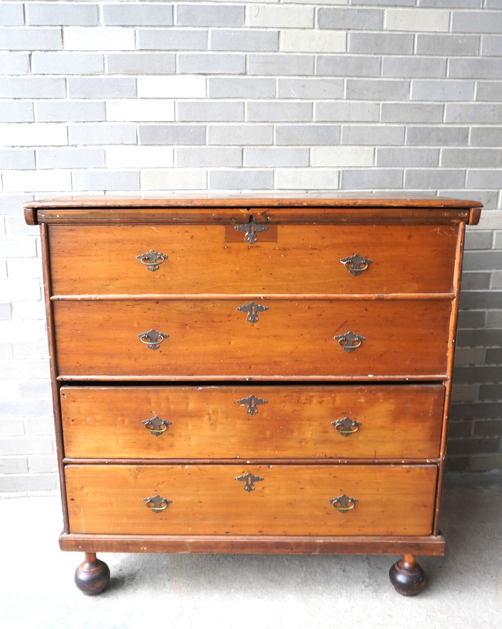 A primitive Federal blanket chest having 2 false drawers over 2 drawers, lid with molded edge and (1 of 14)
