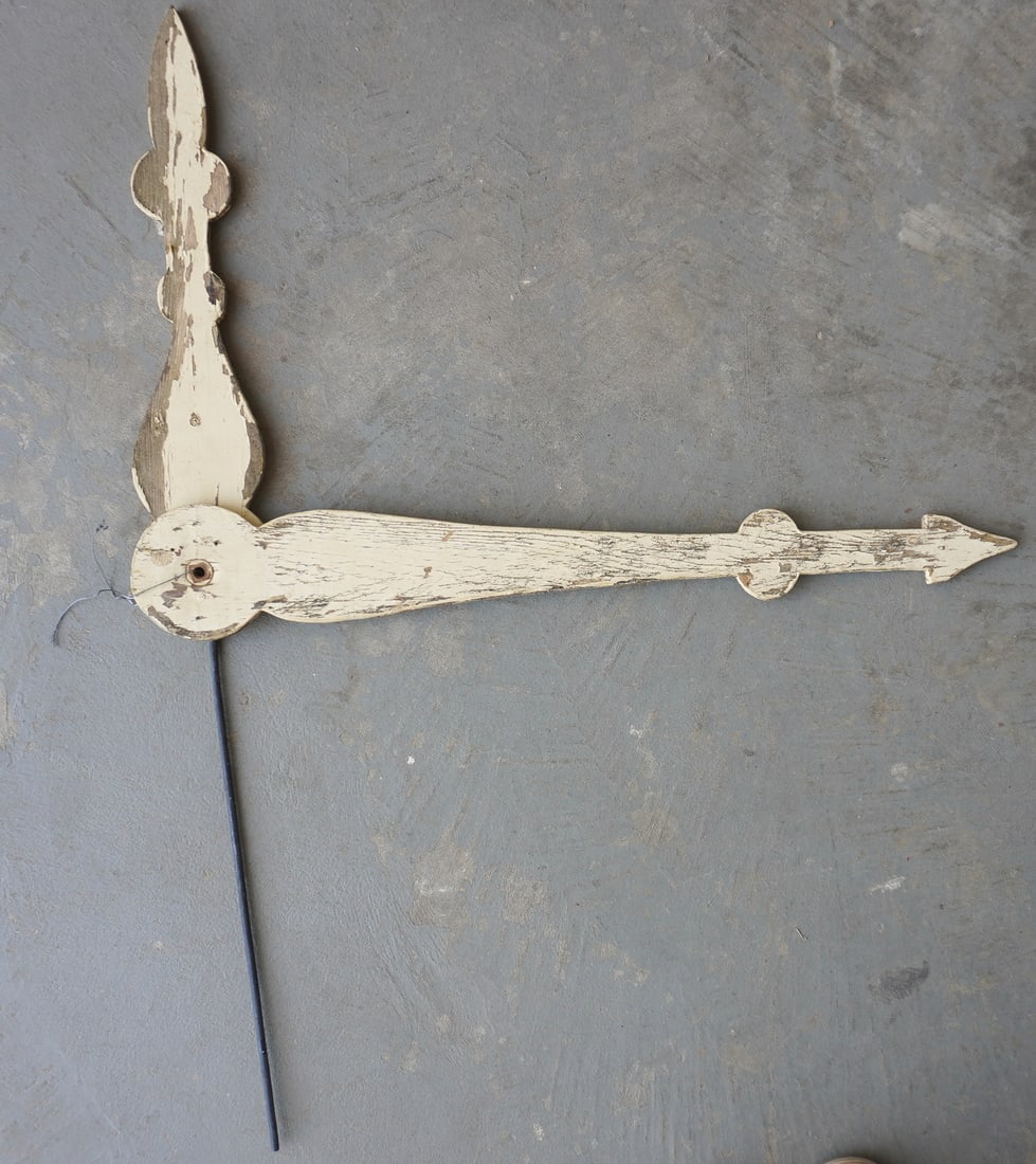 A pair of wooden tower or building clock hands, traces of an older yellow paint. The hands are all: A pair of wooden tower or building clock hands, traces of an older yellow paint. The hands are all hand made and believed to mid to late 19th century and in good structural condition. The largest hand