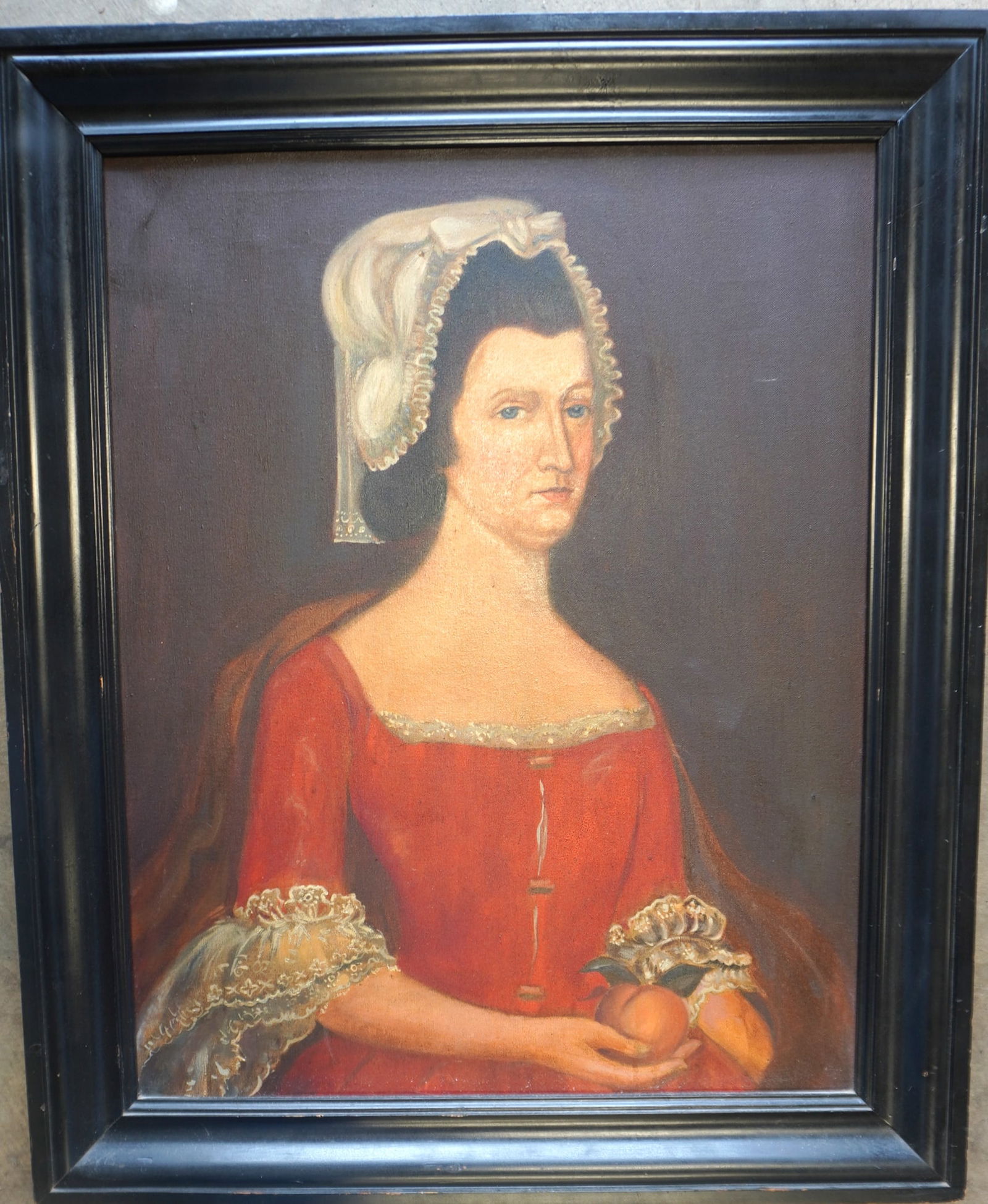 O/C Portrait of lady holding a peach in her hand, probably late 19th century. Relined in 1967 and in: O/C Portrait of lady holding a peach in her hand, probably late 19th century. Relined in 1967 and in very good overall condition - measures 29 1/2" x 35 3/4.