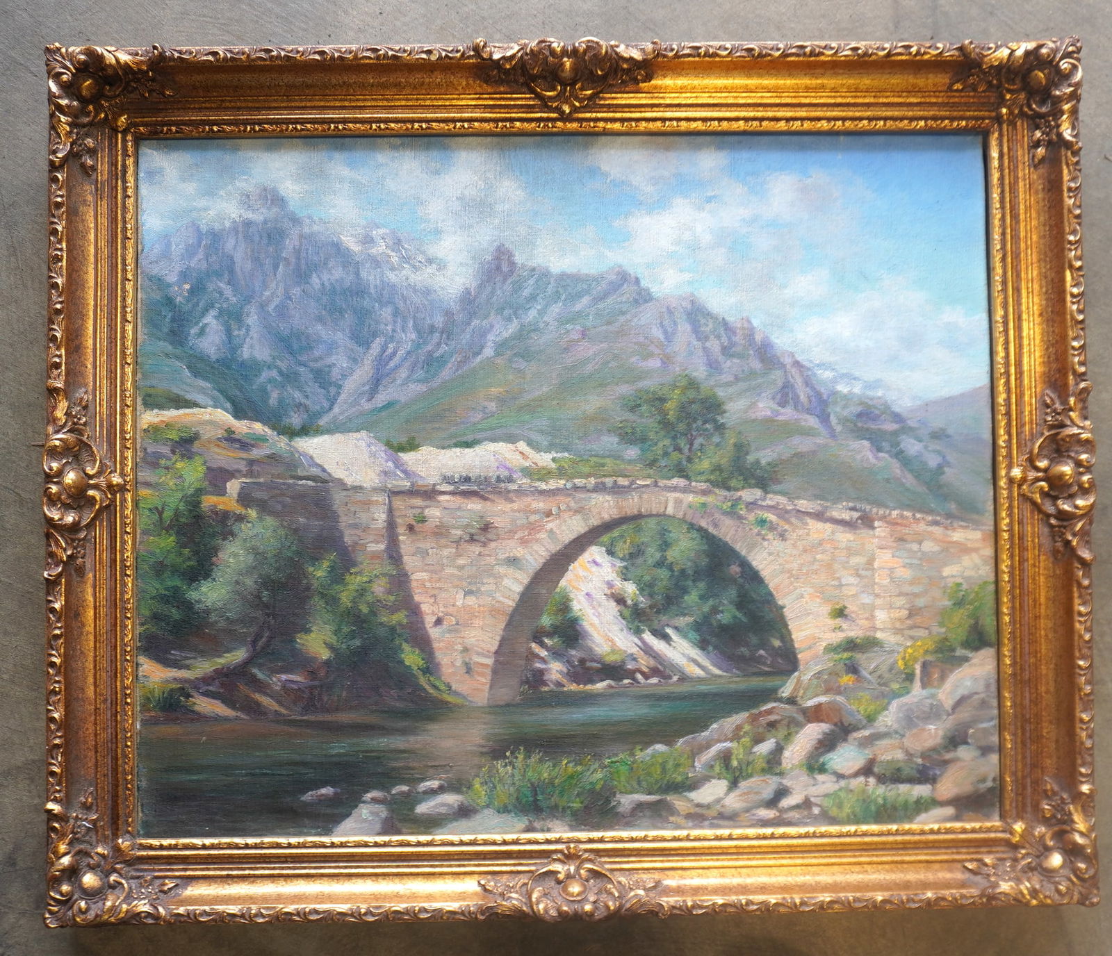 An O/C of an arched stone bridge over river, similar to the ancient French "Pont Ambroix" bridge, (1 of 5)