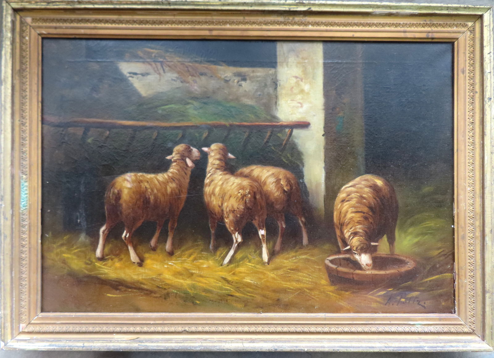 An O/C Interior barn scene with sheep feeding from hay rack and another drinking water - circa 1900.: An O/C Interior barn scene with sheep feeding from hay rack and another drinking water - circa 1900. Signed A. Foltz. Some small repairs only noticeable on reverse canvas, else good condition. Total f