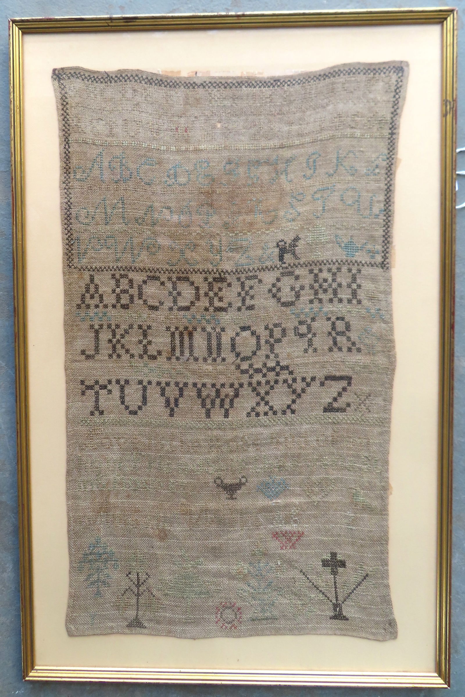 A pictorial and alphabet sampler with verse that reads "Love Is The Rosebud Of An Hour. Friendship (1 of 10)
