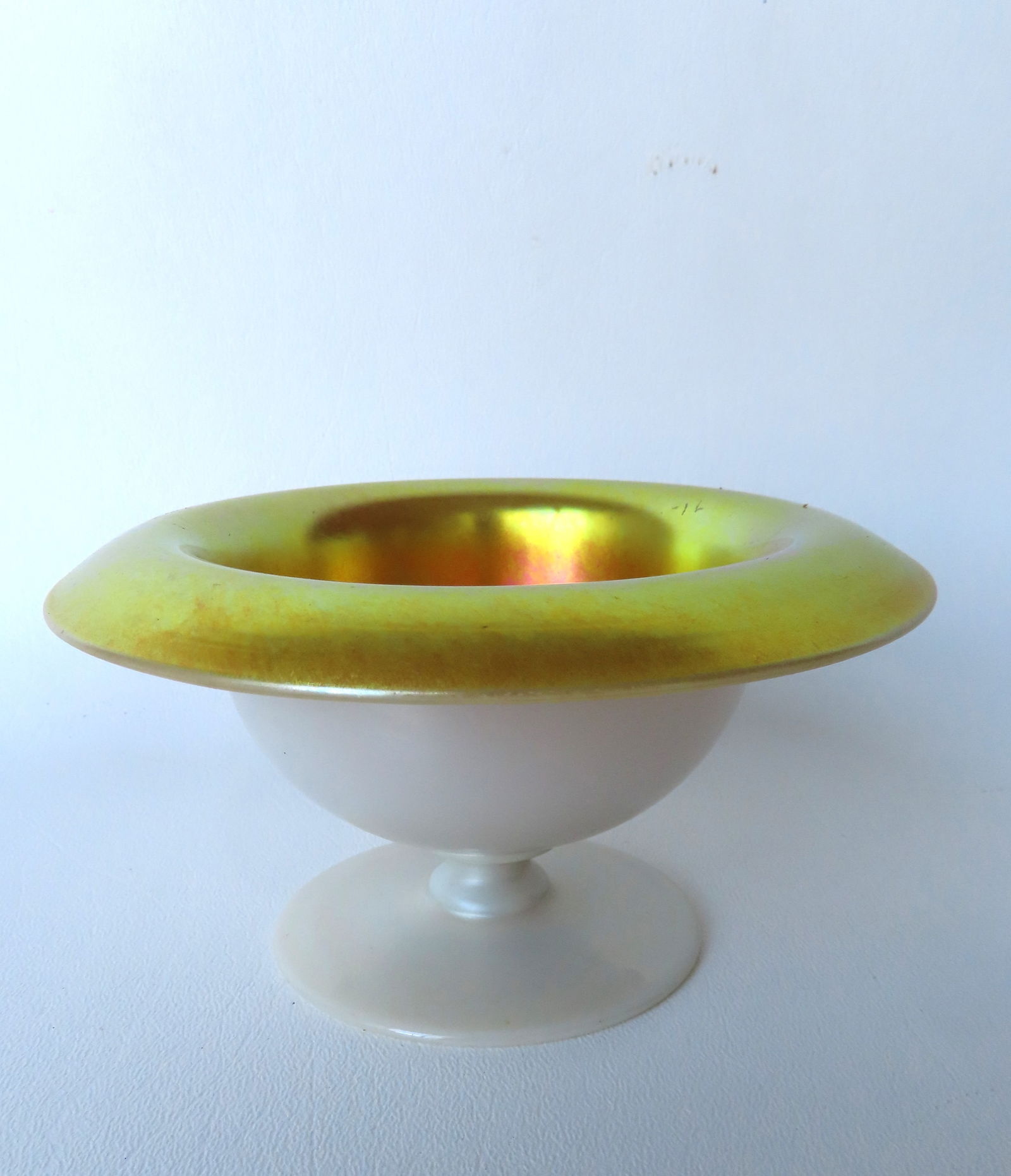 A Steuben Gold Aurene and calcite footed compote with polished pontil, not signed. Measures 5 3/8" (1 of 5)