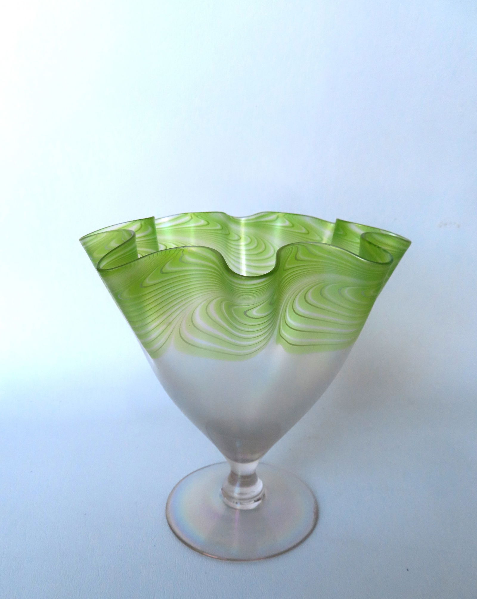 An art glass vase with yellow string lines around perimeter of pinched ruffled edge, not signed. (1 of 5)