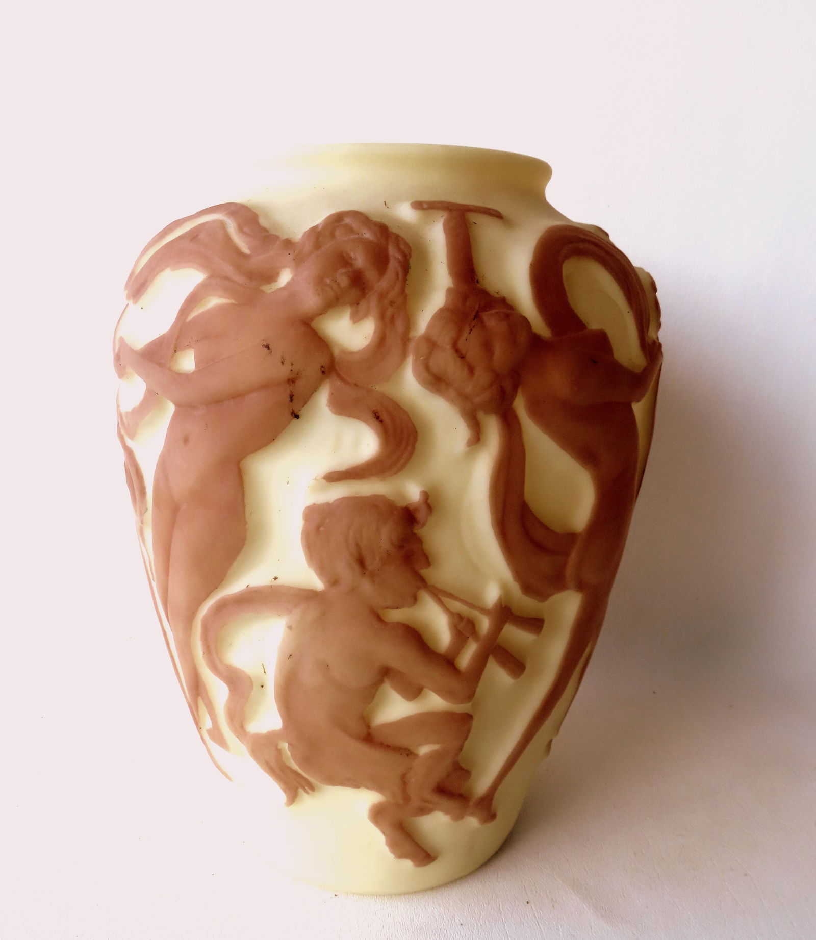 An Art Deco art glass vase decorated with embossed Dancing Nudes, unsigned by attributed to the (1 of 7)