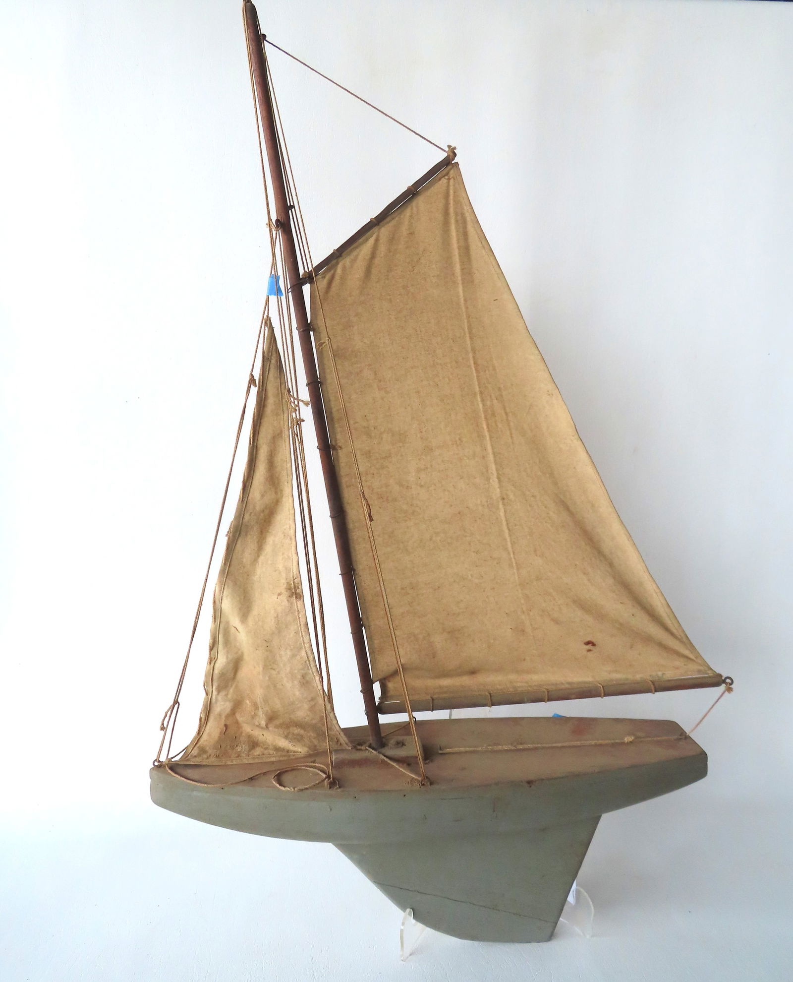 A handmade pond sailboat model with original sails and having a hull in original green paint, early (1 of 7)