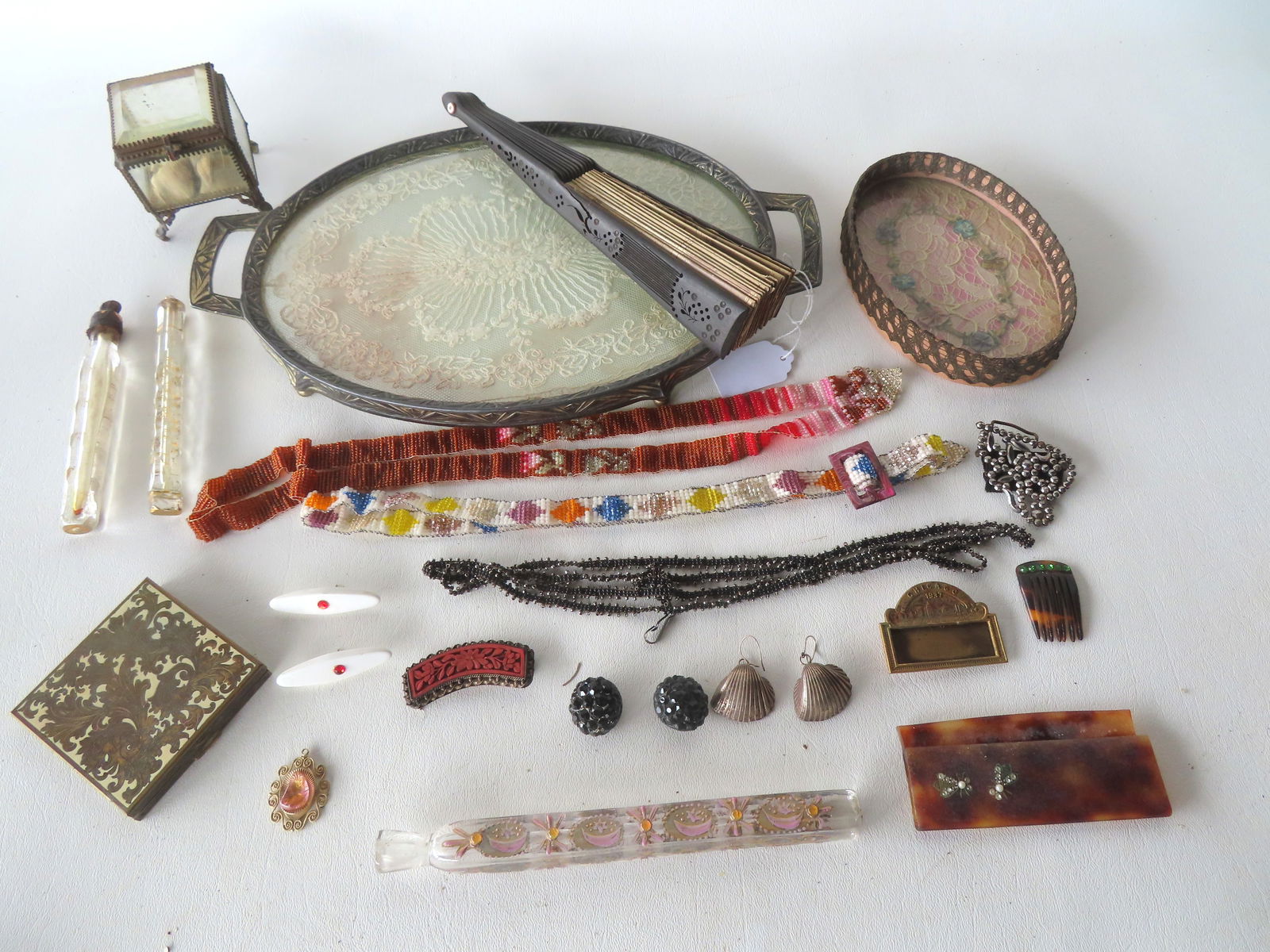 Grouping of decorative objects: Vintage fan decorated with photographic bull fighting cards: Grouping of decorative objects: Vintage fan decorated with photographic bull fighting cards including bulls, matadors, and other animals, signed J. Laurent & Co. Madrid & Paris - one arm is broken but