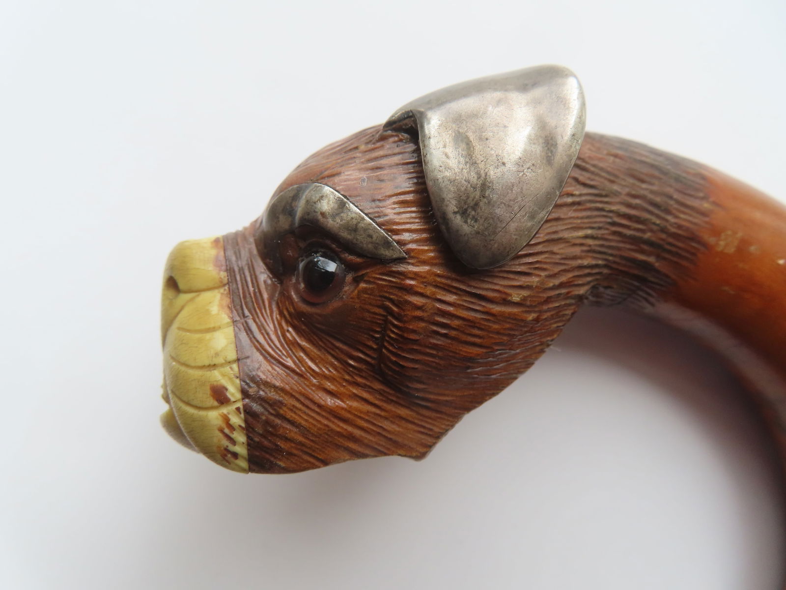 A wooden walking stick, having a carved wooden Boxer dog head handle with silver ears and silver - 2