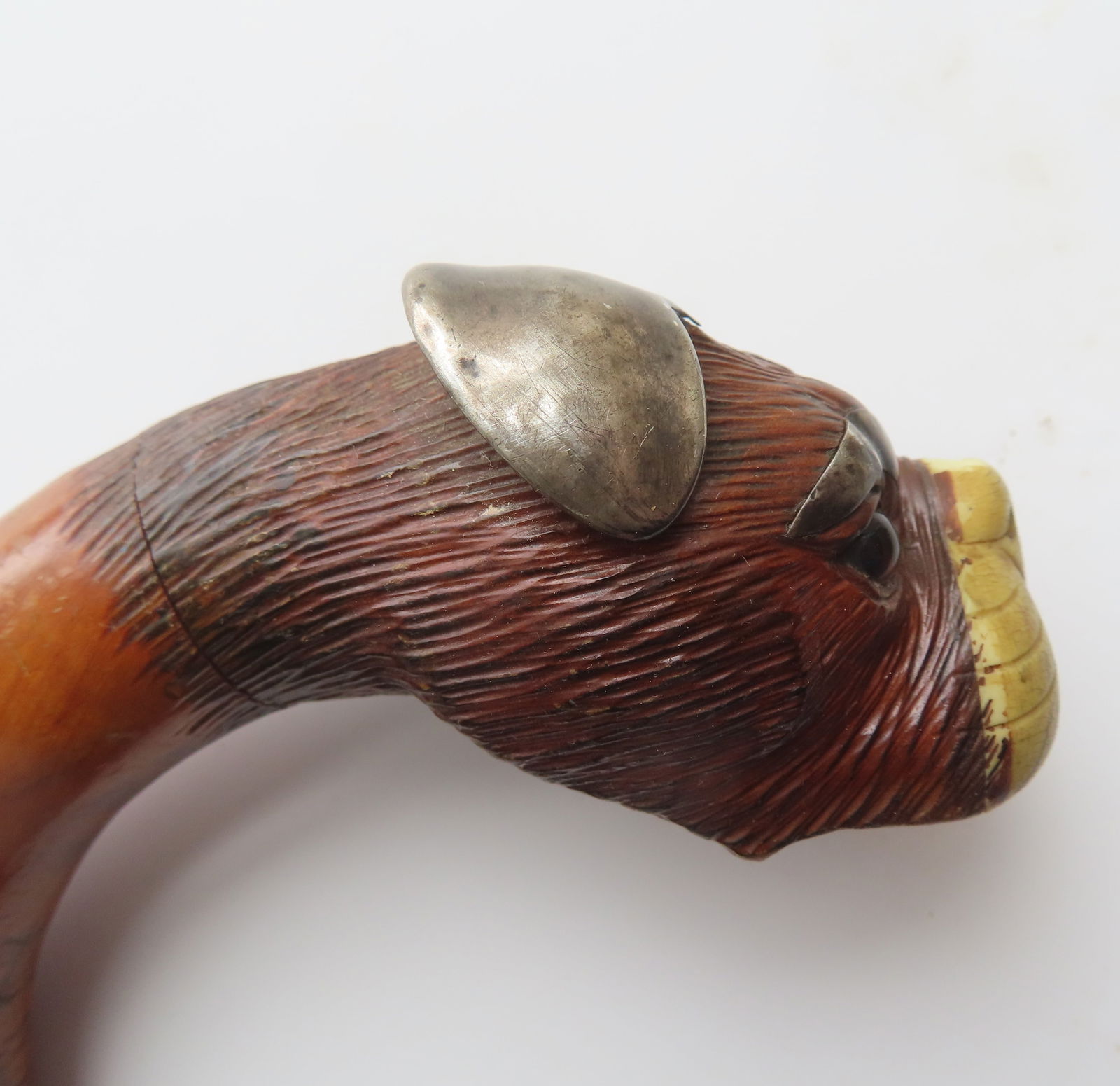 A wooden walking stick, having a carved wooden Boxer dog head handle with silver ears and silver - 4