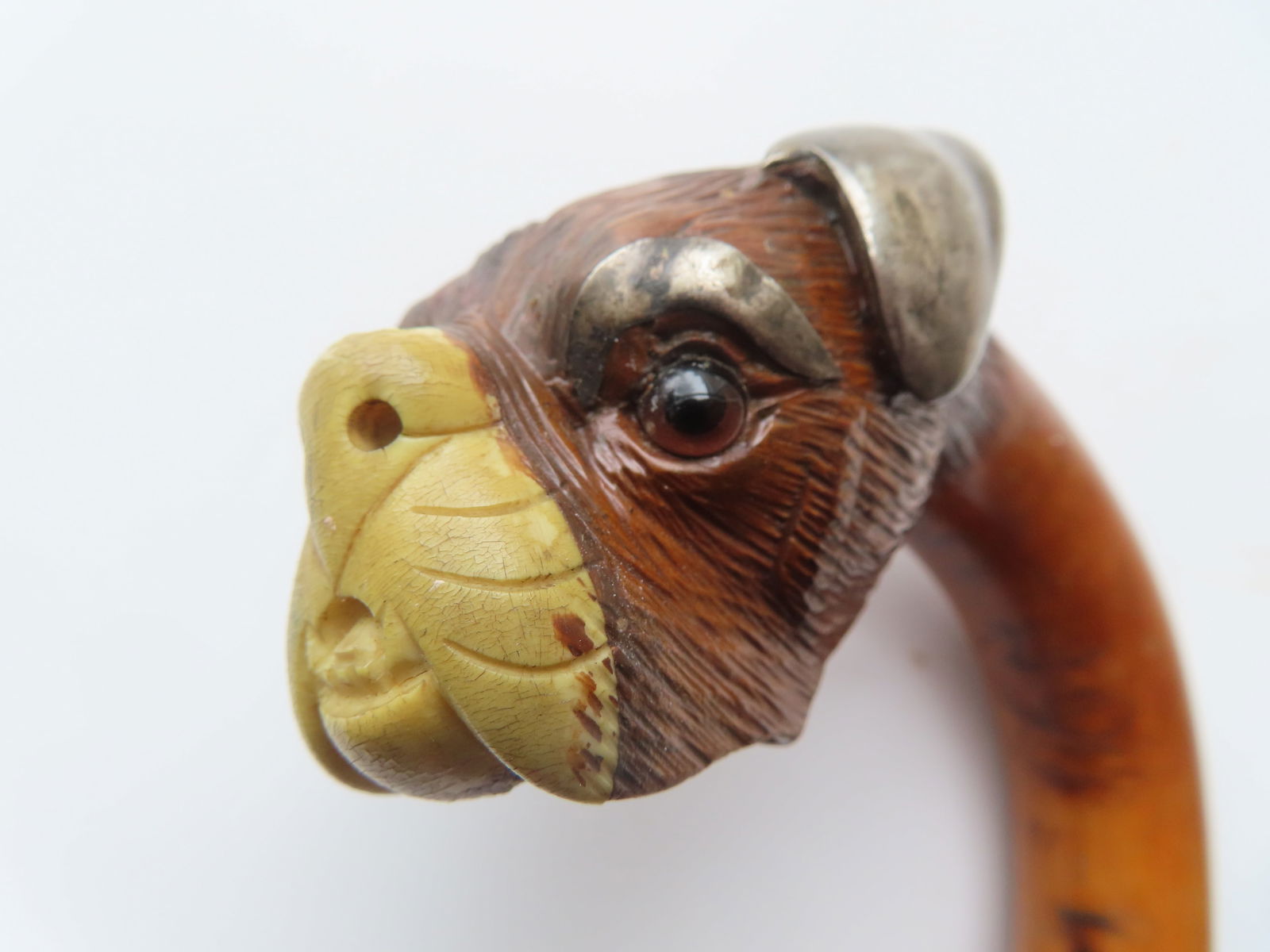 A wooden walking stick, having a carved wooden Boxer dog head handle with silver ears and silver - 8