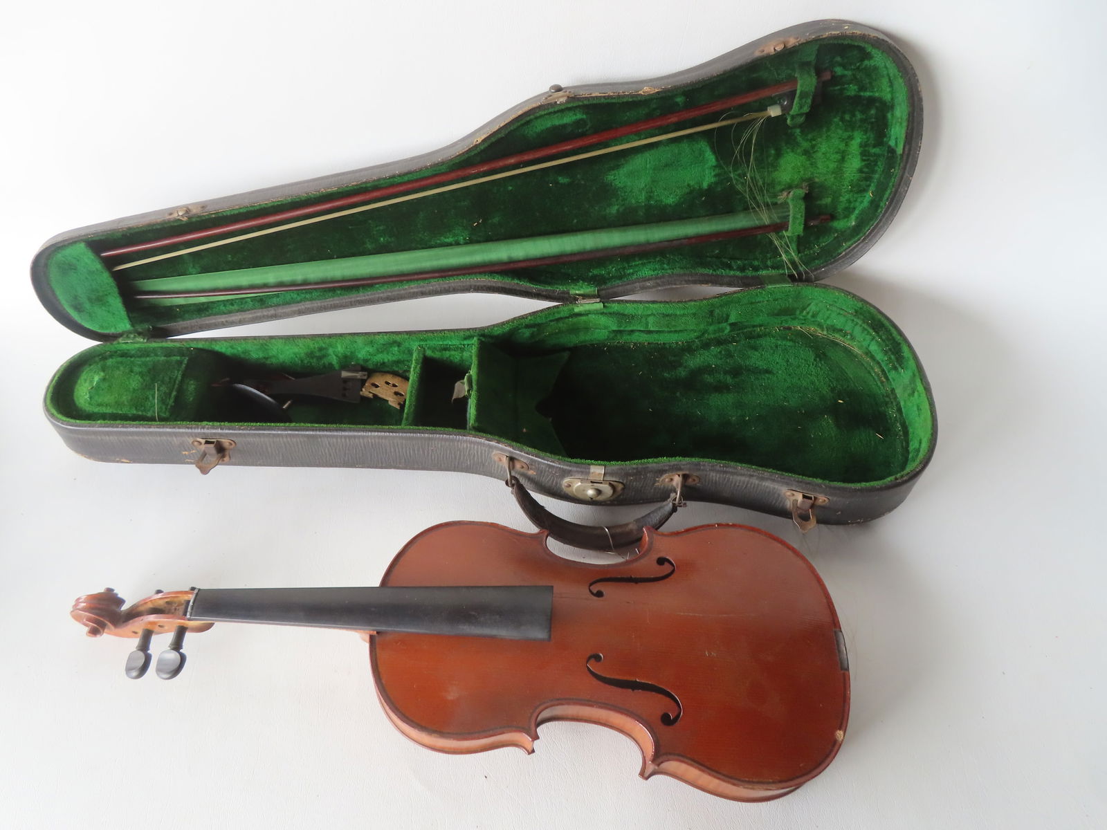 A vintage French violin with strong tiger maple back plate, neck and side apron. Original paper (1 of 19)