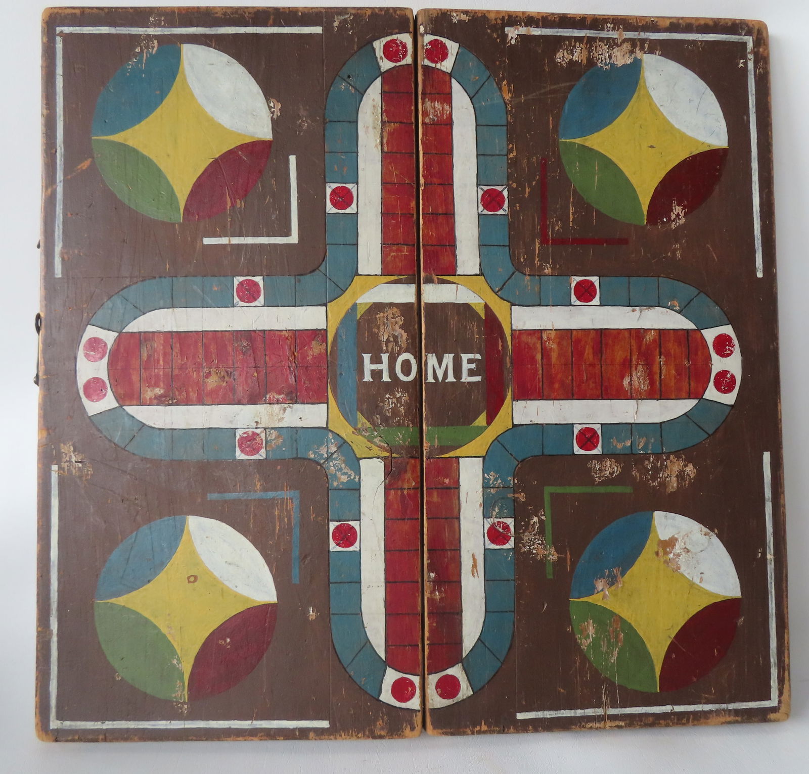 A hand painted Parcheesi folding game board. Appears to retain original paint, circa 1880-1900. Some (1 of 4)